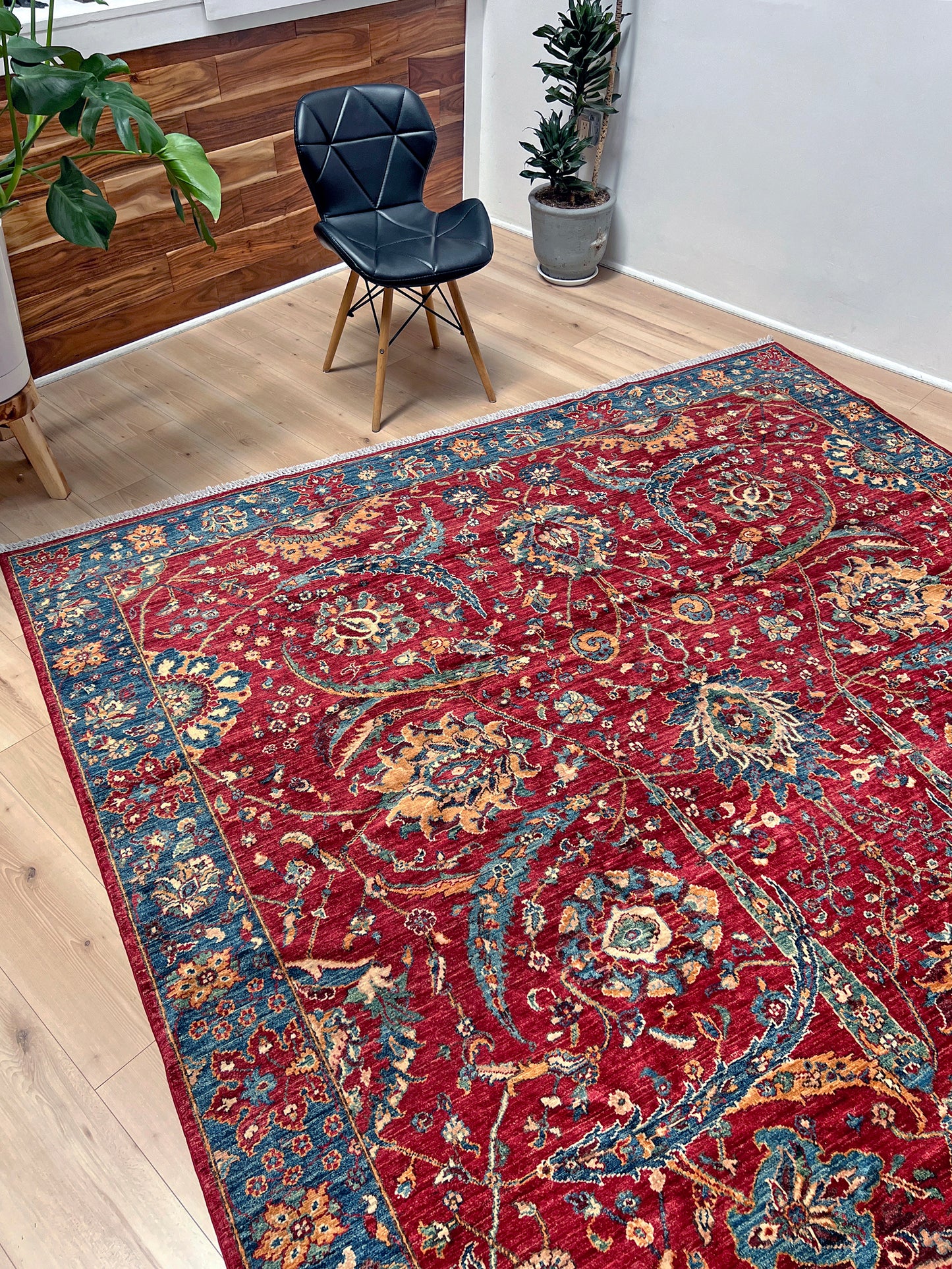 8x10 Sickle Leaf Luxury Area Rug&nbsp;• Handmade Wool Carpet large Rug for Living Room, Bedroom, Dining &amp; Office
This exquisite oriental rug features the traditional Persian sickle leaf design elegantly woven on a rich red ground. The intricate blue borders add a touch of sophistication, enhancing the rug's timeless appeal. Crafted from the finest silky wool, this rug offers both luxurious softness and exceptional durability.