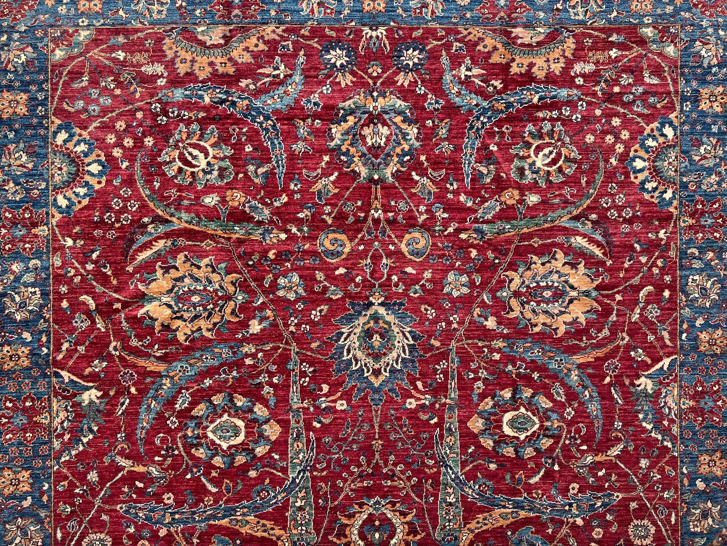 8x10 Sickle Leaf Luxury Area Rug&nbsp;• Handmade Wool Carpet large Rug for Living Room, Bedroom, Dining &amp; Office
This exquisite oriental rug features the traditional Persian sickle leaf design elegantly woven on a rich red ground. The intricate blue borders add a touch of sophistication, enhancing the rug's timeless appeal. Crafted from the finest silky wool, this rug offers both luxurious softness and exceptional durability.