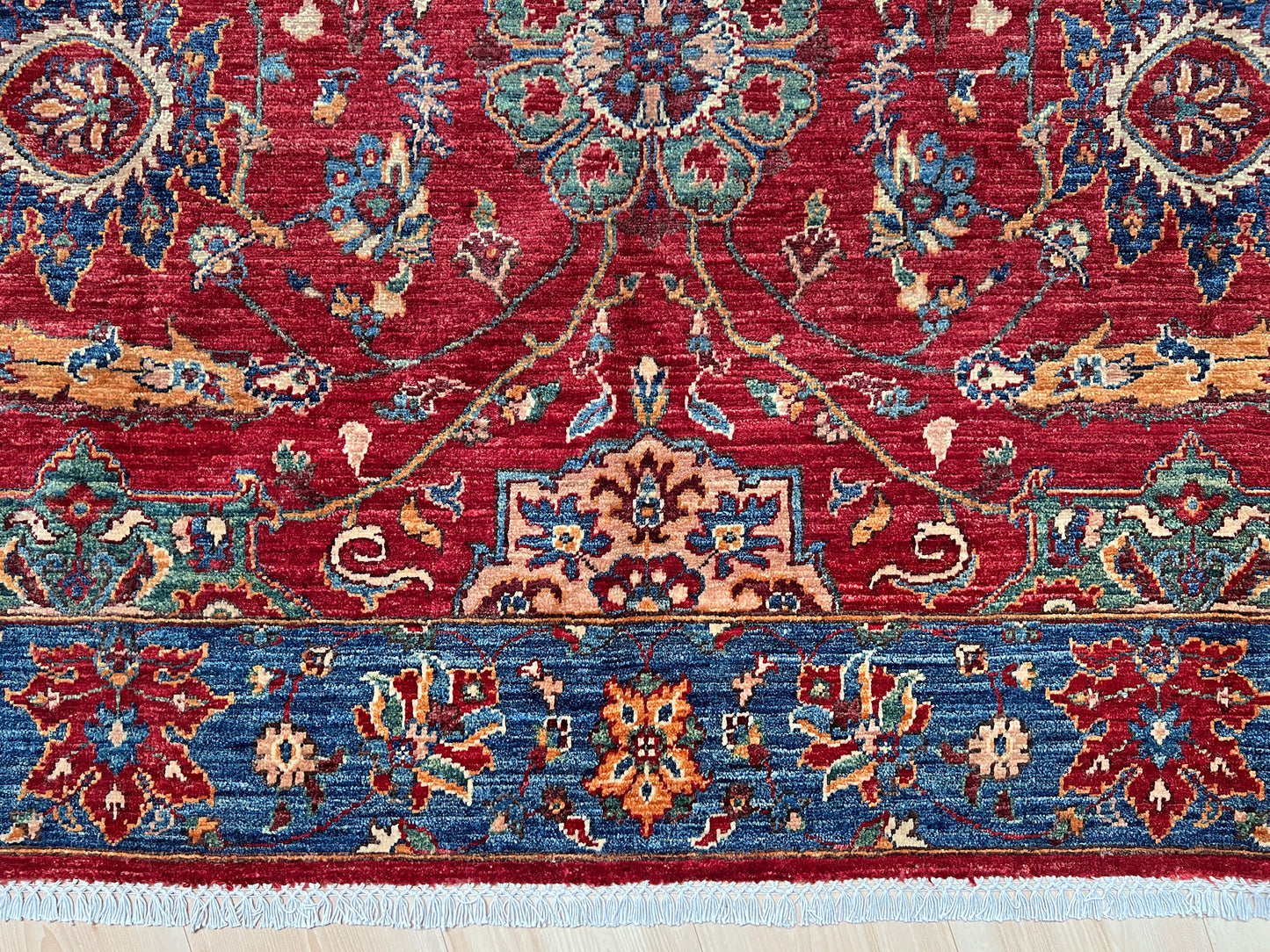 8x10 Sickle Leaf Luxury Area Rug&nbsp;• Handmade Wool Carpet large Rug for Living Room, Bedroom, Dining &amp; Office
This exquisite oriental rug features the traditional Persian sickle leaf design elegantly woven on a rich red ground. The intricate blue borders add a touch of sophistication, enhancing the rug's timeless appeal. Crafted from the finest silky wool, this rug offers both luxurious softness and exceptional durability.