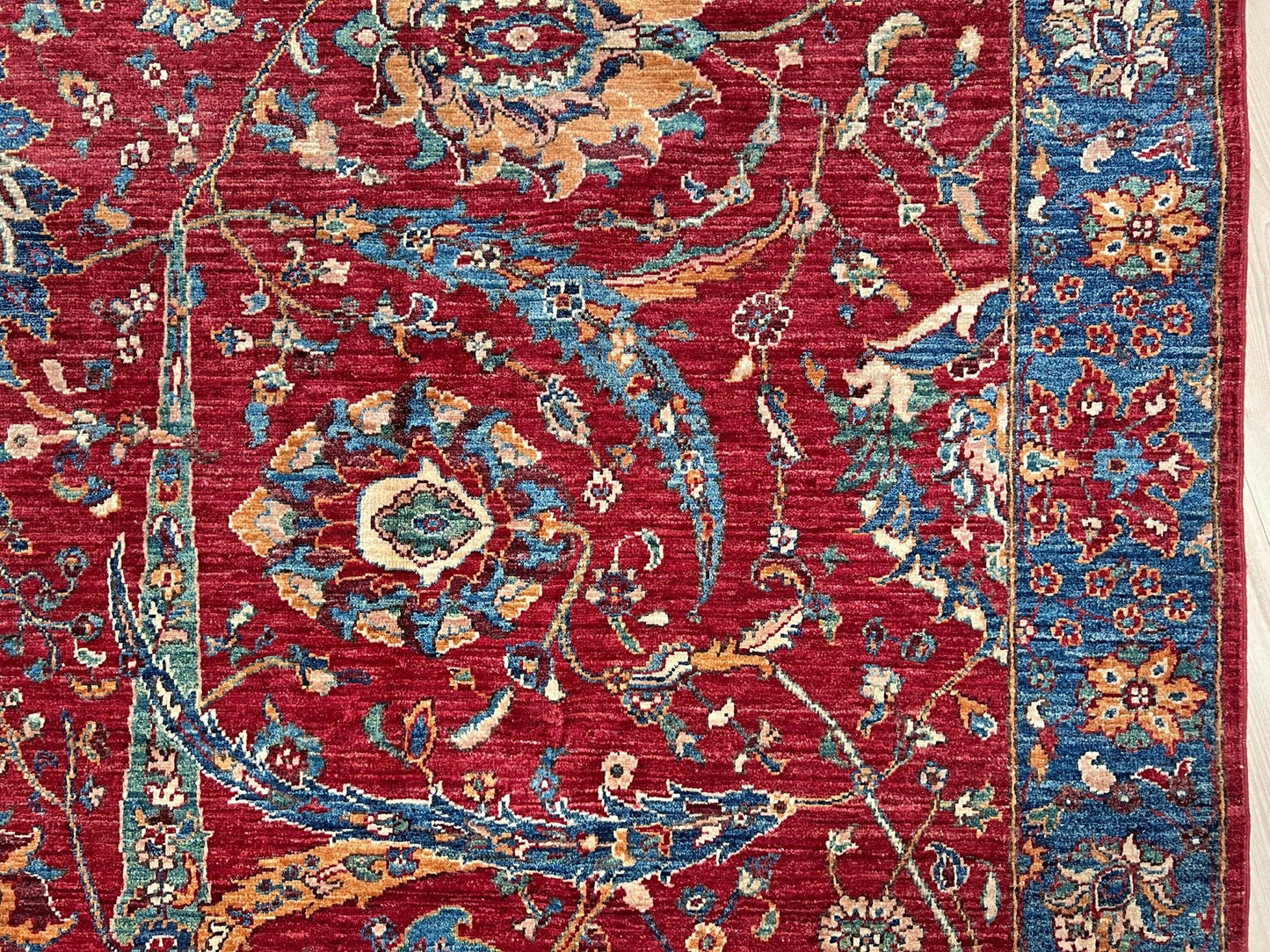 8x10 Sickle Leaf Luxury Area Rug&nbsp;• Handmade Wool Carpet large Rug for Living Room, Bedroom, Dining &amp; Office
This exquisite oriental rug features the traditional Persian sickle leaf design elegantly woven on a rich red ground. The intricate blue borders add a touch of sophistication, enhancing the rug's timeless appeal. Crafted from the finest silky wool, this rug offers both luxurious softness and exceptional durability.