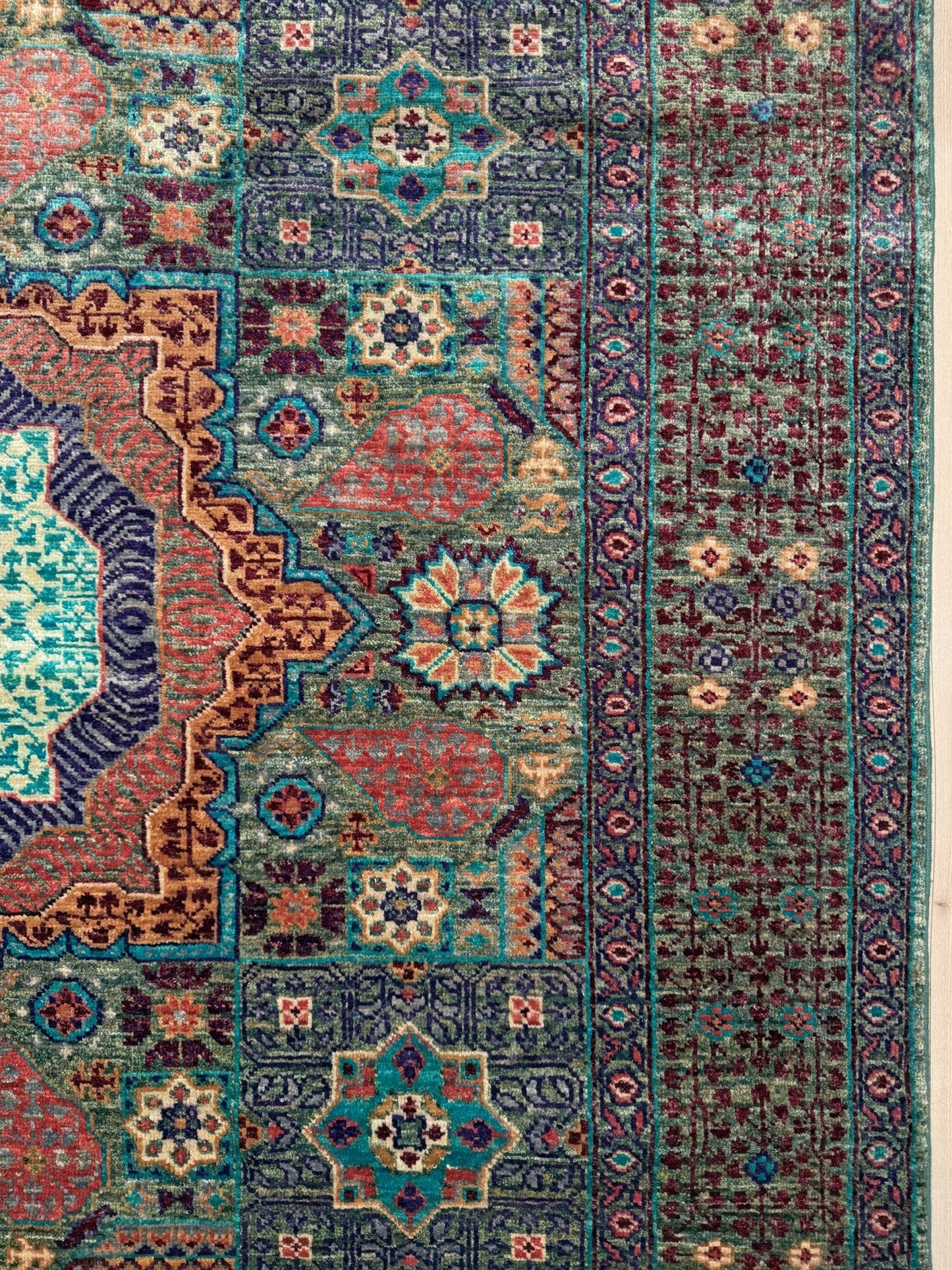 Handmade 6x8 Mamluk rug featuring a sage green field with terracotta, turquoise, navy, coral, and plum motifs, perfect for living room, bedroom, kitchen, or dining room. Ideal for traditional, eclectic, bohemian, or transitional home decor styles. From the best rug shop in Burlingame, SF Bay Area—free shipping available.