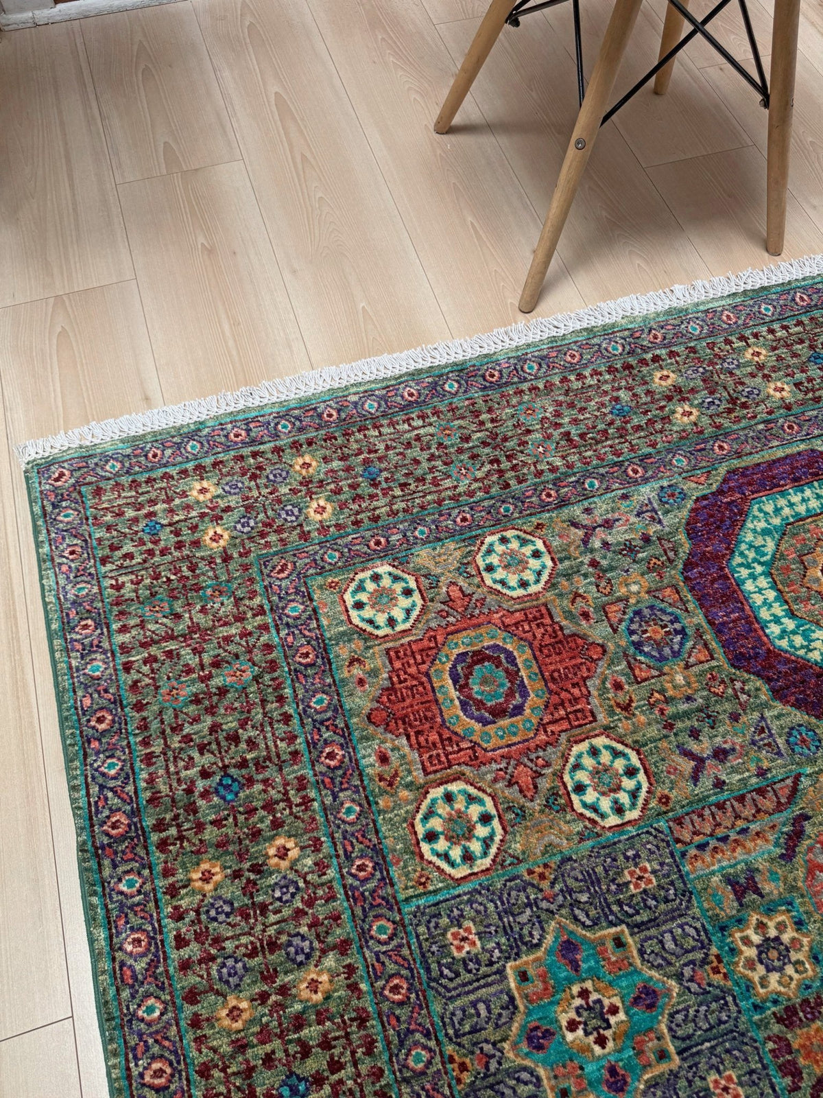 Handmade 6x8 Mamluk rug with a sage green field with terracotta, turquoise, navy, coral, and plum motifs, perfect for living room, bedroom, kitchen, or dining room. The best rug shop in Burlingame, SF Bay Area.