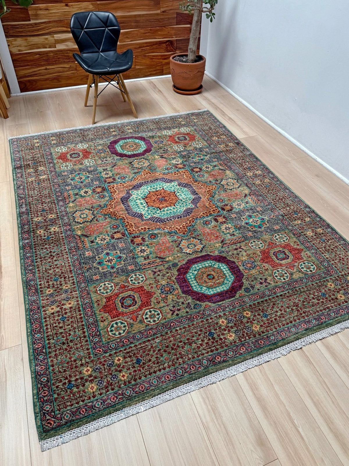 Handmade 6x8 Mamluk rug with a sage green field with terracotta, turquoise, navy, coral, and plum motifs, perfect for living room, bedroom, kitchen, or dining room. The best rug shop in Burlingame, SF Bay Area.
