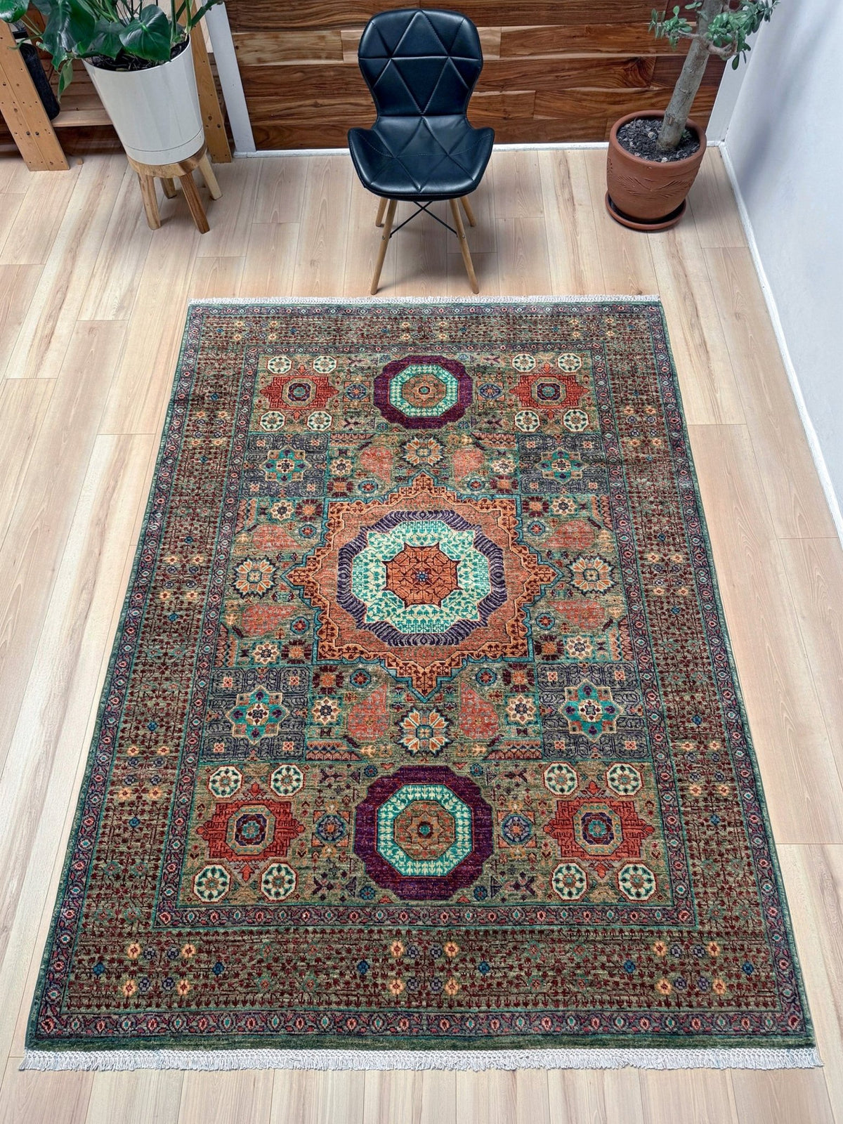 Handmade 6x8 Mamluk rug with a sage green field with terracotta, turquoise, navy, coral, and plum motifs, perfect for living room, bedroom, kitchen, or dining room. The best rug shop in Burlingame, SF Bay Area.