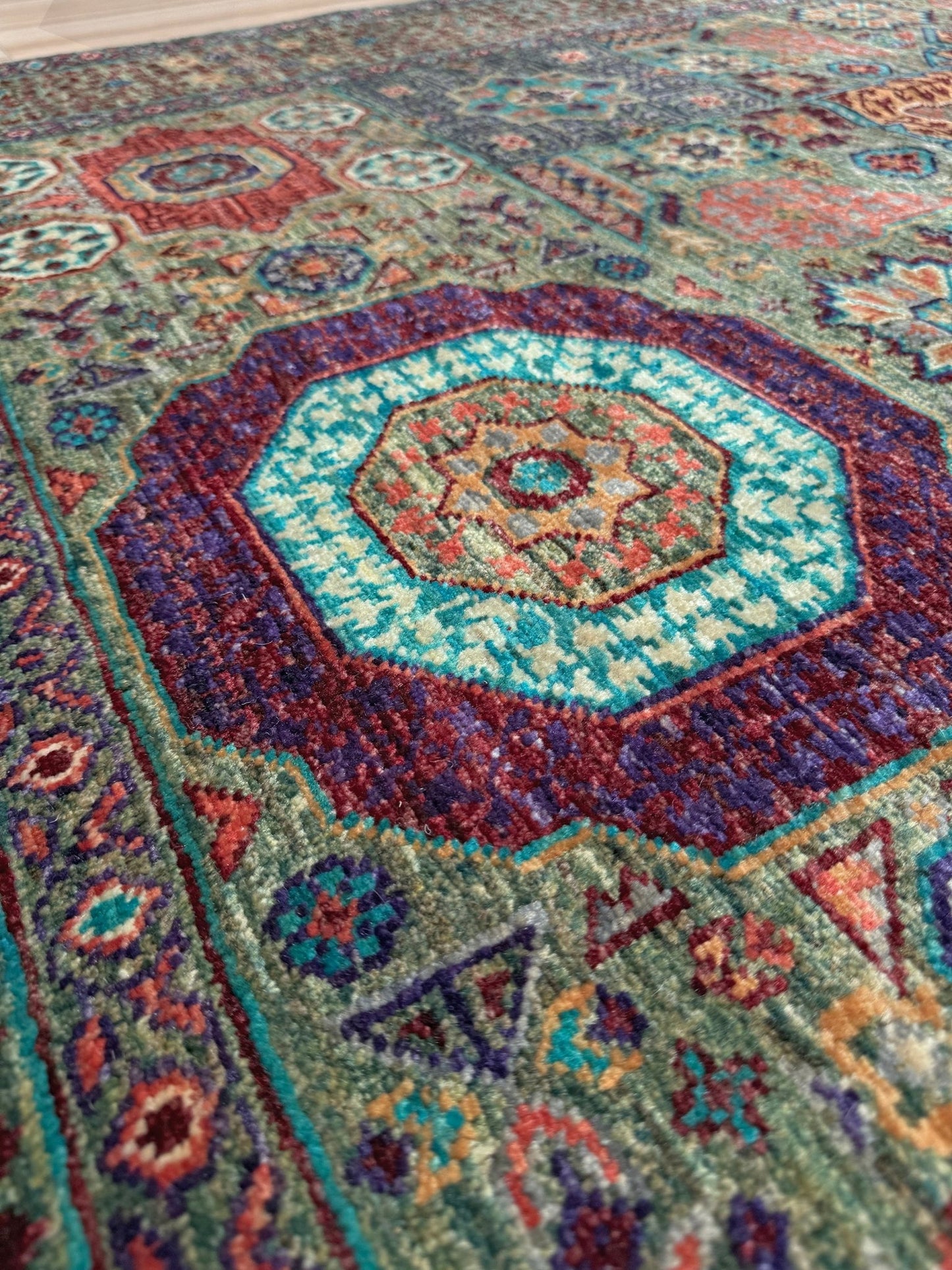 Handmade 6x8 Mamluk rug featuring a sage green field with terracotta, turquoise, navy, coral, and plum motifs, perfect for living room, bedroom, kitchen, or dining room. Ideal for traditional, eclectic, bohemian, or transitional home decor styles. From the best rug shop in Burlingame, SF Bay Area—free shipping available.
