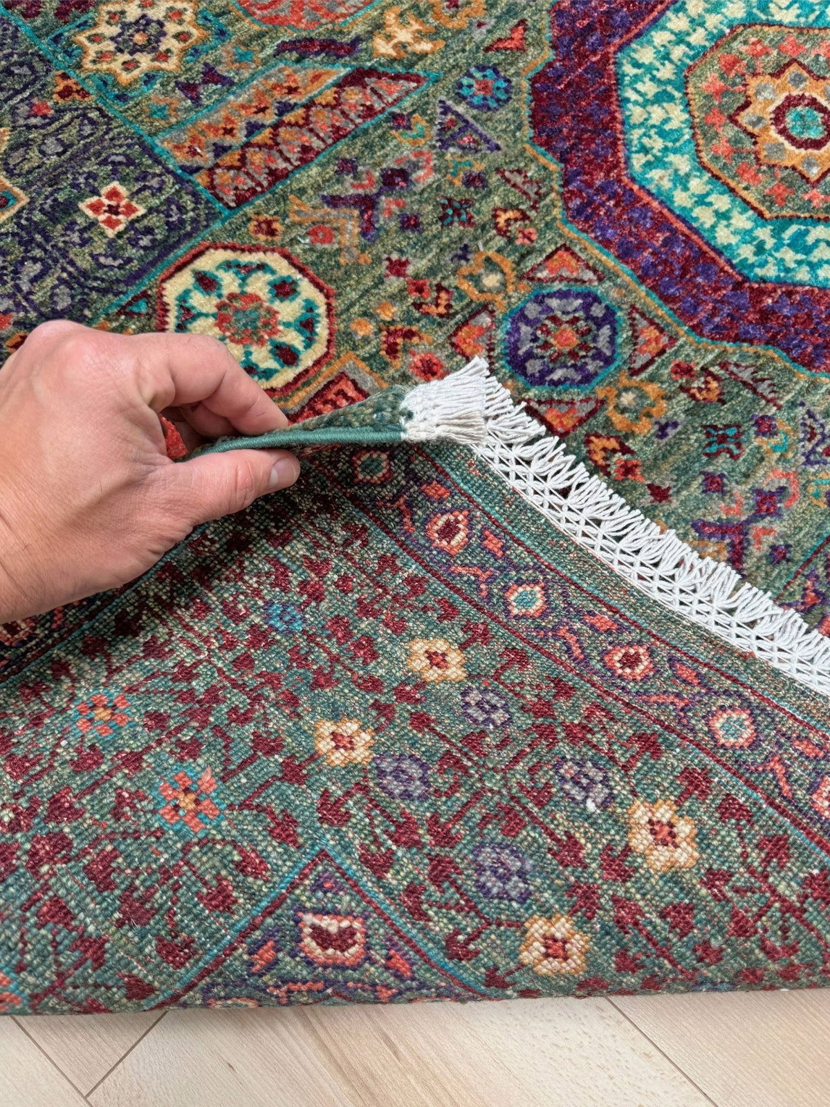 Handmade 6x8 Mamluk rug with a sage green field with terracotta, turquoise, navy, coral, and plum motifs, perfect for living room, bedroom, kitchen, or dining room. The best rug shop in Burlingame, SF Bay Area.
