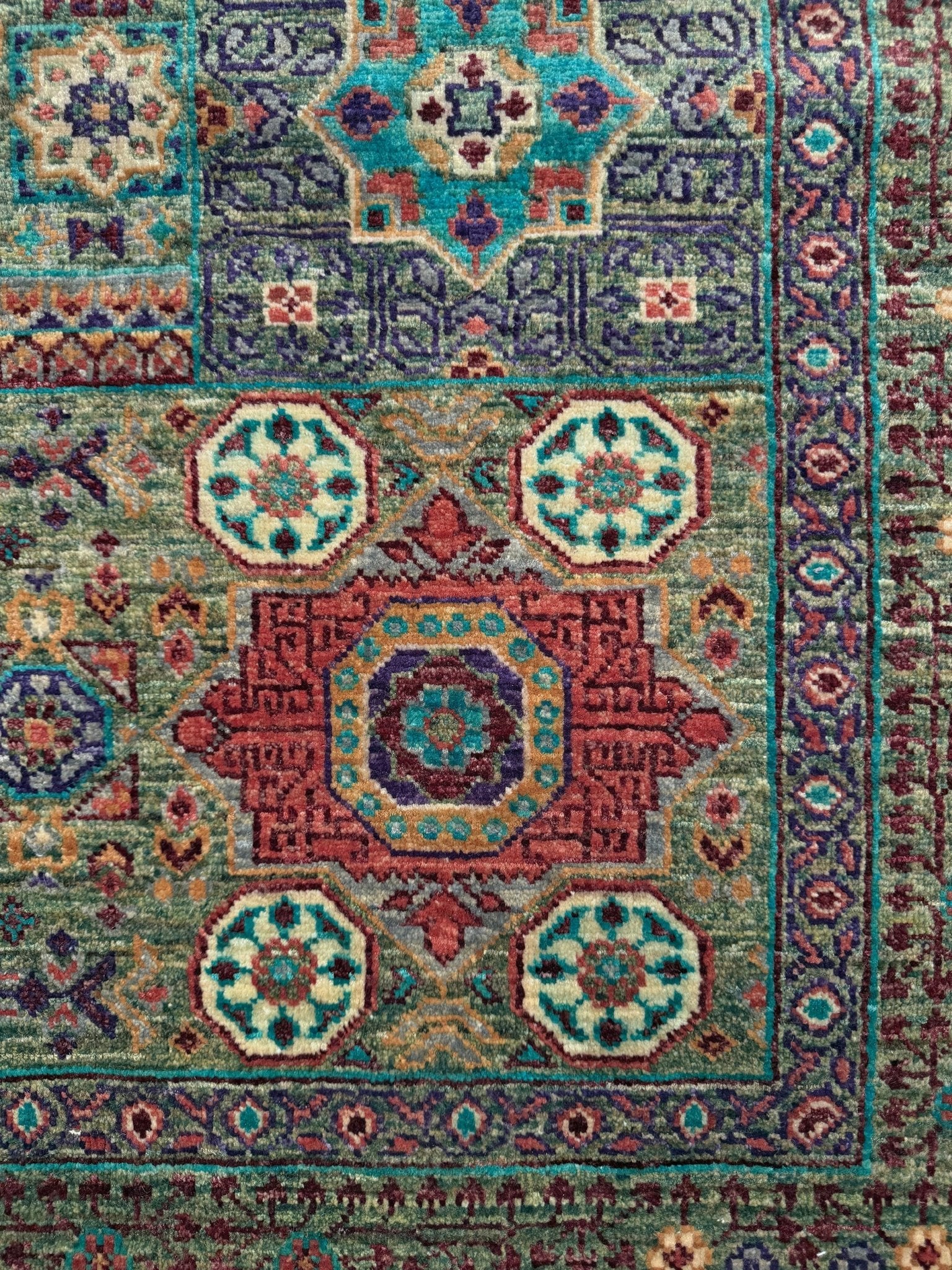 Handmade 6x8 Mamluk rug featuring a sage green field with terracotta, turquoise, navy, coral, and plum motifs, perfect for living room, bedroom, kitchen, or dining room. Ideal for traditional, eclectic, bohemian, or transitional home decor styles. From the best rug shop in Burlingame, SF Bay Area—free shipping available.