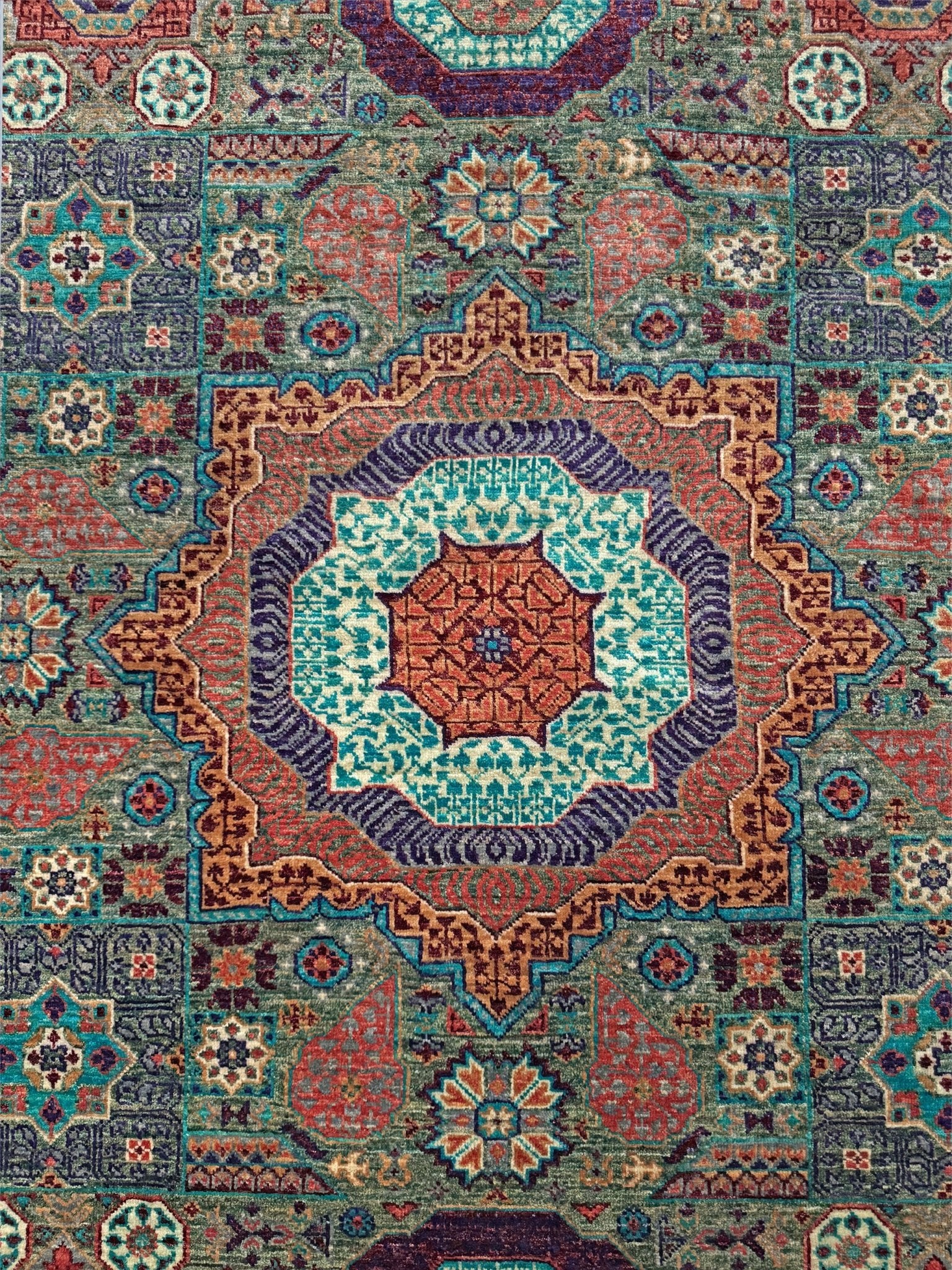 Handmade 6x8 Mamluk rug featuring a sage green field with terracotta, turquoise, navy, coral, and plum motifs, perfect for living room, bedroom, kitchen, or dining room. Ideal for traditional, eclectic, bohemian, or transitional home decor styles. From the best rug shop in Burlingame, SF Bay Area—free shipping available.