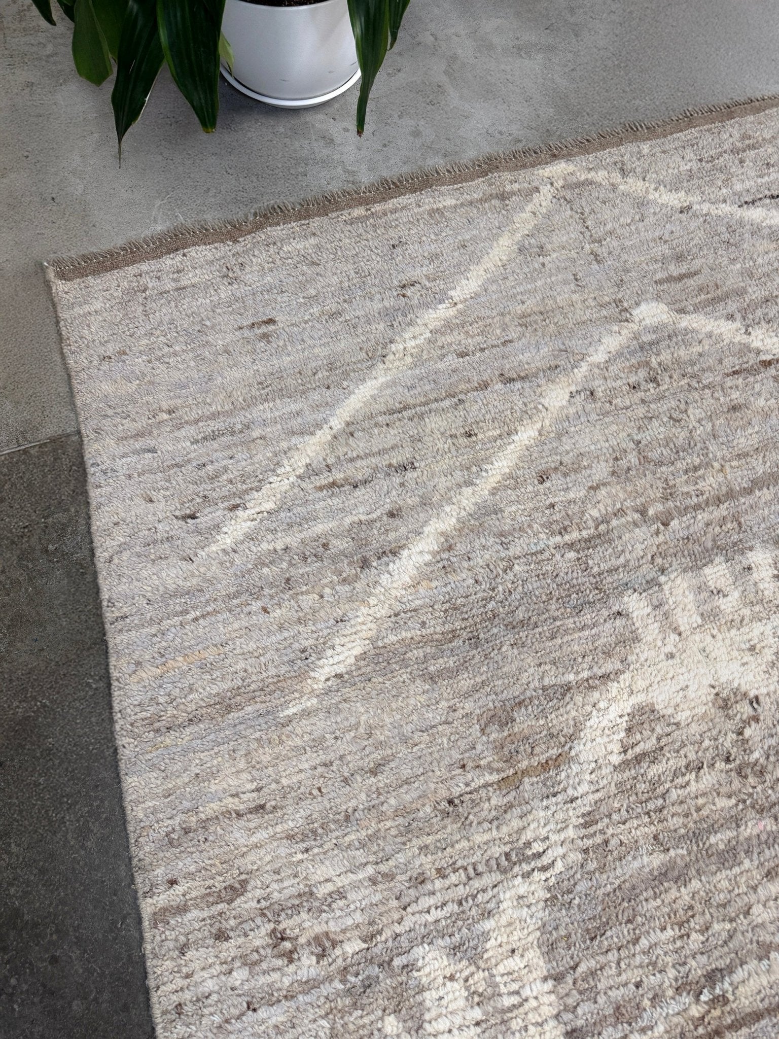 Brand new 9x12 Turkish Tulu Organic Modern  rug with warm greige field, soft ivory abstract tribal motifs, taupe and oatmeal tones, handmade wool area rug from Indigo Rugs Burlingame Bay Area.