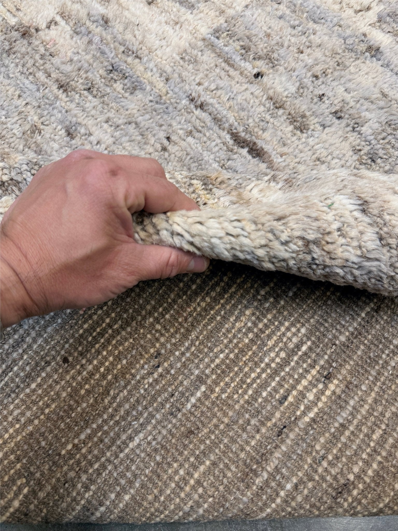 Brand new 9x12 Turkish Tulu Organic Modern  rug with warm greige field, soft ivory abstract tribal motifs, taupe and oatmeal tones, handmade wool area rug from Indigo Rugs Burlingame Bay Area.