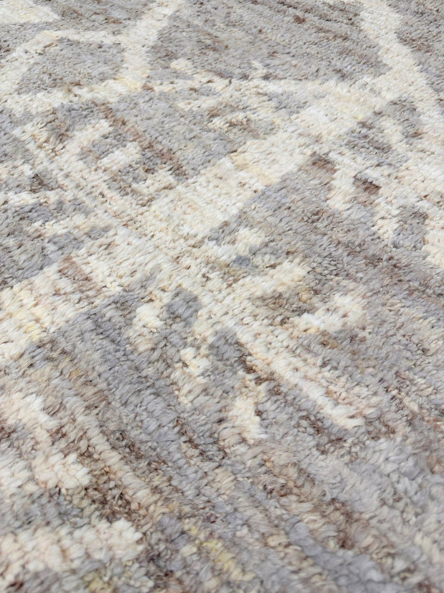 Brand new 9x12 Turkish Tulu Organic Modern  rug with warm greige field, soft ivory abstract tribal motifs, taupe and oatmeal tones, handmade wool area rug from Indigo Rugs Burlingame Bay Area.