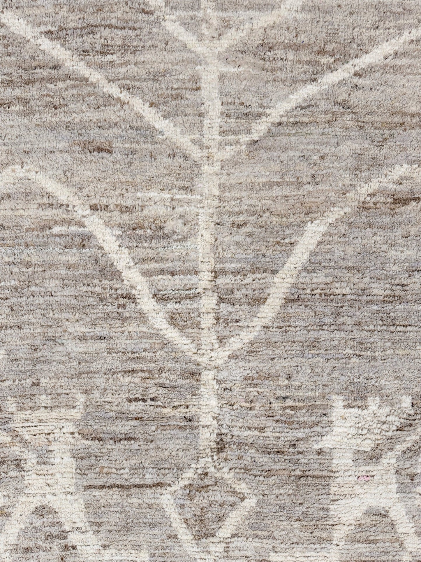 Brand new 9x12 Turkish Tulu Organic Modern  rug with warm greige field, soft ivory abstract tribal motifs, taupe and oatmeal tones, handmade wool area rug from Indigo Rugs Burlingame Bay Area.