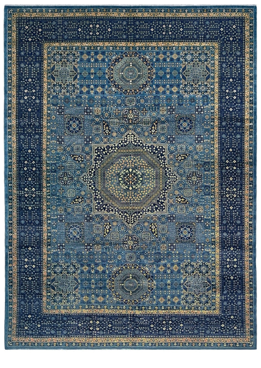 Decorative blue rug with intricate patterns. Brand new fine Mamluk rug 10x14 with navy, denim blue, and soft gold geometric medallion design, high knot density (50×50 ~156 KPSI), perfect for large living rooms and dining spaces. From Indigo Rugs, Burlingame — the best rug shop in the San Francisco Bay Area. Free shipping.