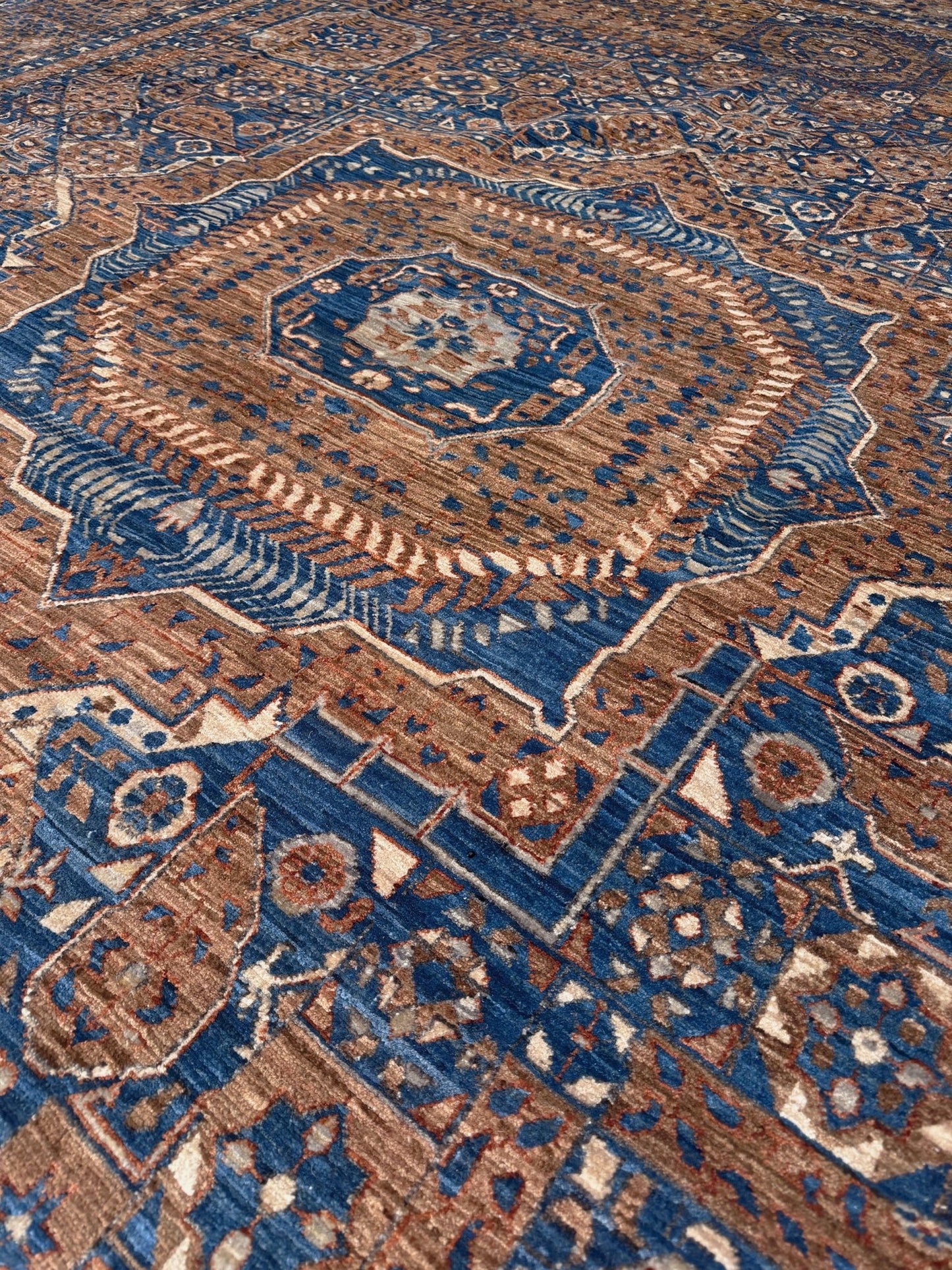 50x50 handmade Mamluk rug with walnut brown field, denim blue geometric medallions, ivory and taupe details, traditional wool area rug 9x12 from Indigo Rugs Burlingame Bay Area.