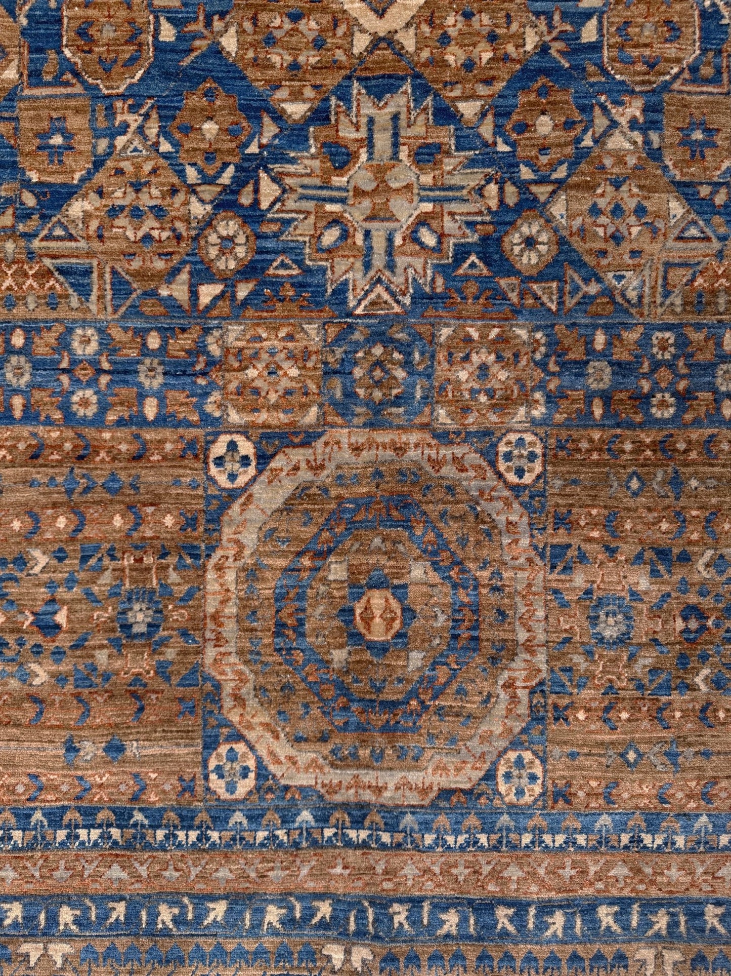 50x50 handmade Mamluk rug with walnut brown field, denim blue geometric medallions, ivory and taupe details, traditional wool area rug 9x12 from Indigo Rugs Burlingame Bay Area.