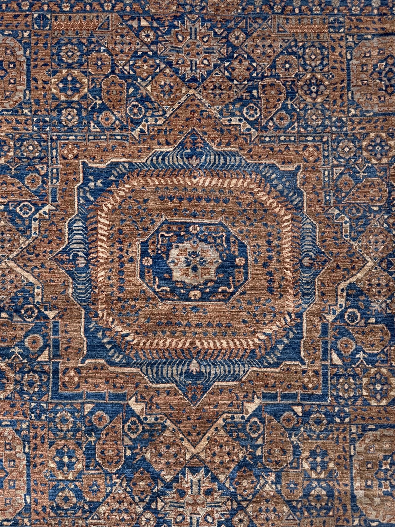 50x50 handmade Mamluk rug with walnut brown field, denim blue geometric medallions, ivory and taupe details, traditional wool area rug 9x12 from Indigo Rugs Burlingame Bay Area.