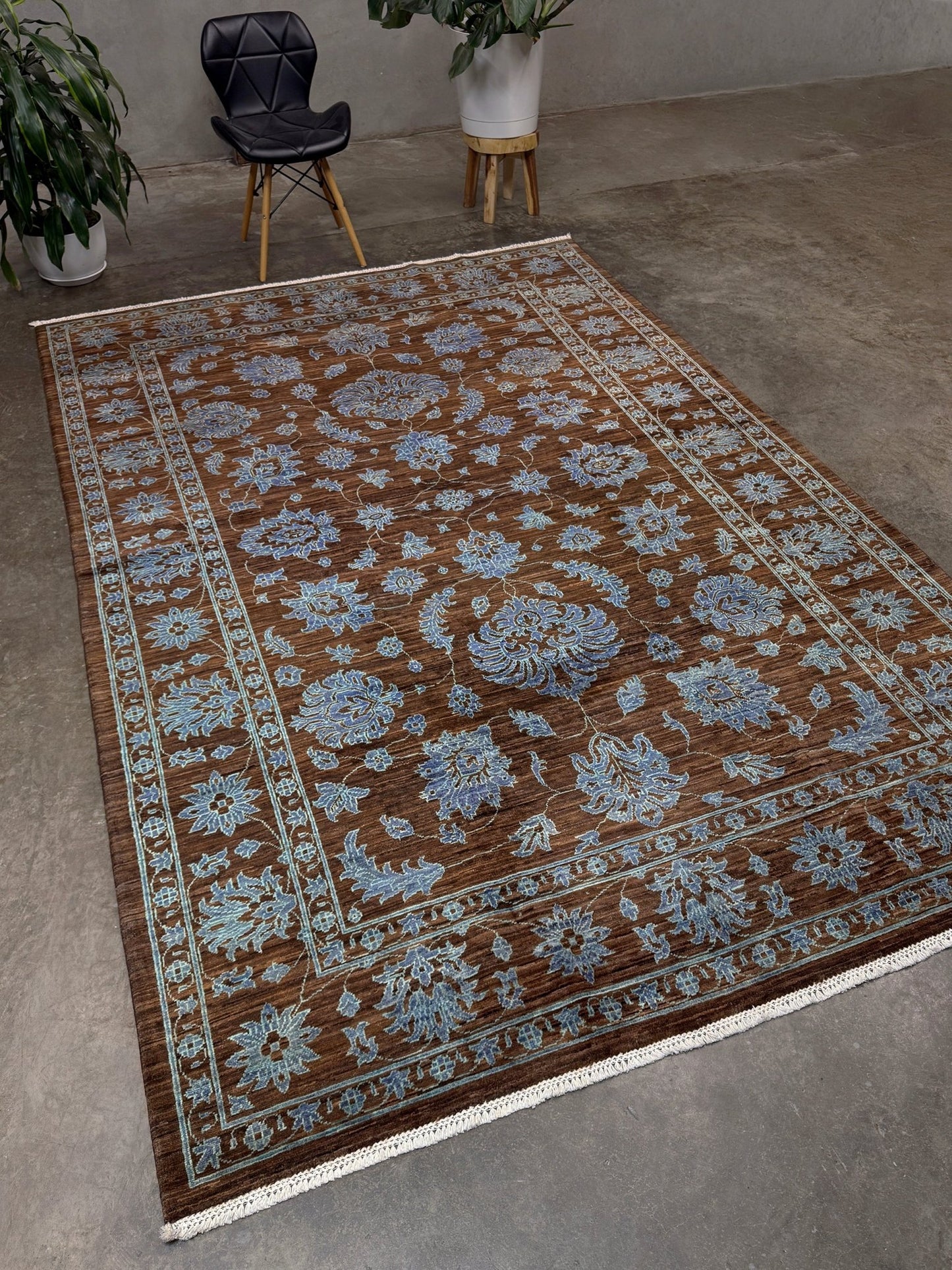 Brand new handmade floral rug with walnut brown, blue and soft turquoise accents, wool area rug 7x9 from Indigo Rugs Burlingame Bay Area.
