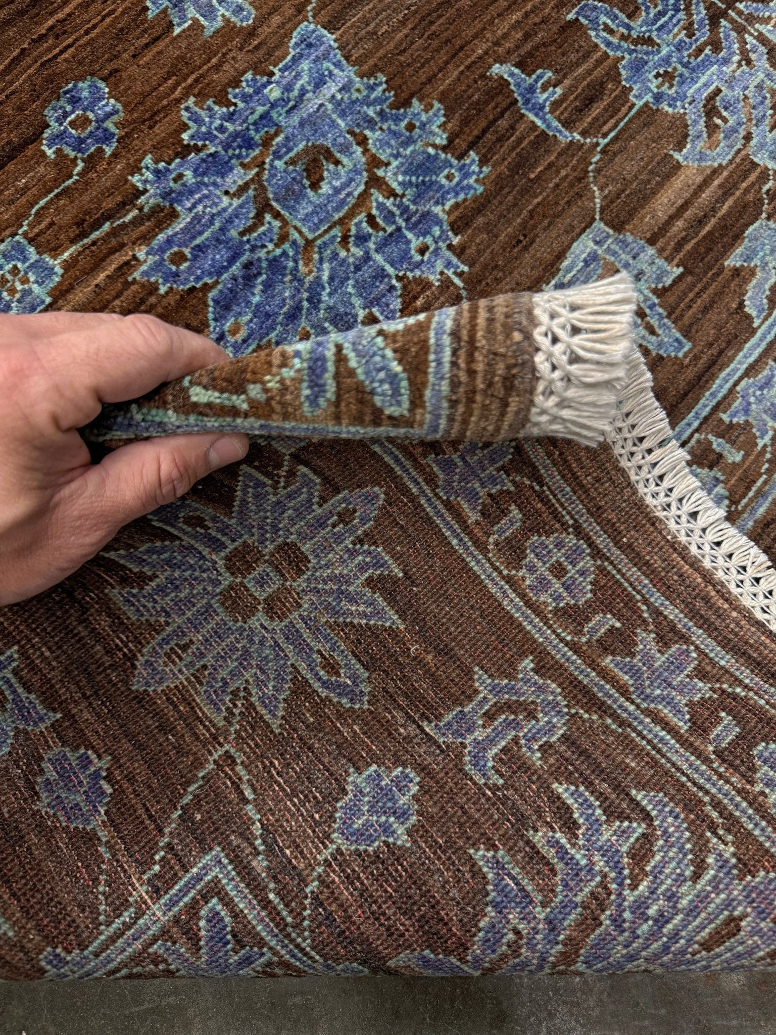 Brand new handmade floral rug with walnut brown, blue and soft turquoise accents, wool area rug 7x9 from Indigo Rugs Burlingame Bay Area.