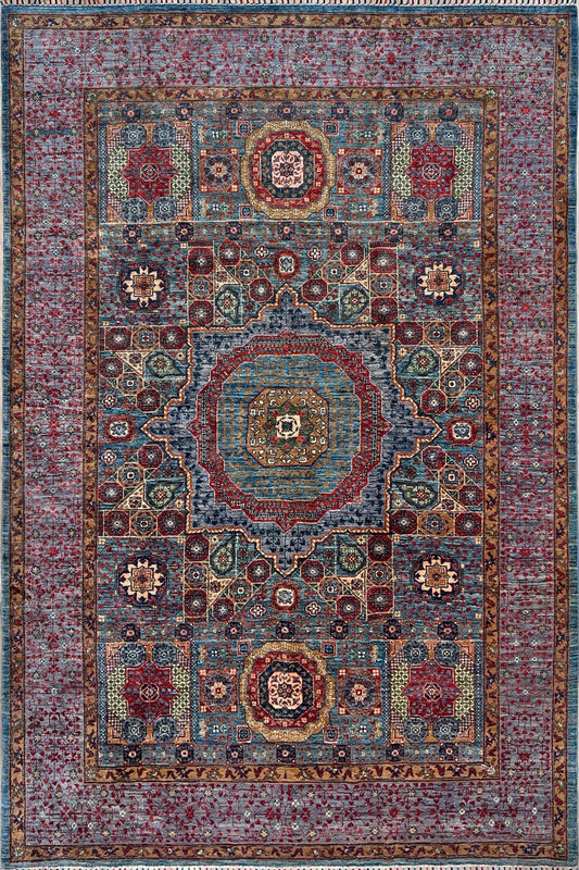 Sultanate Mamluk Luxury Area Rug • Handmade Ghazni Wool Carpet • 7x10 Large Rug for Living Room, Bedroom, Dining. Handmade rug shop san francisco bay area.
Crafted from Ghazni wool, known for its silk-like sheen and softness, this Mamluk rug boasts an extraordinary vibrant color combination with hues of blue, red, grey, yellow and green.