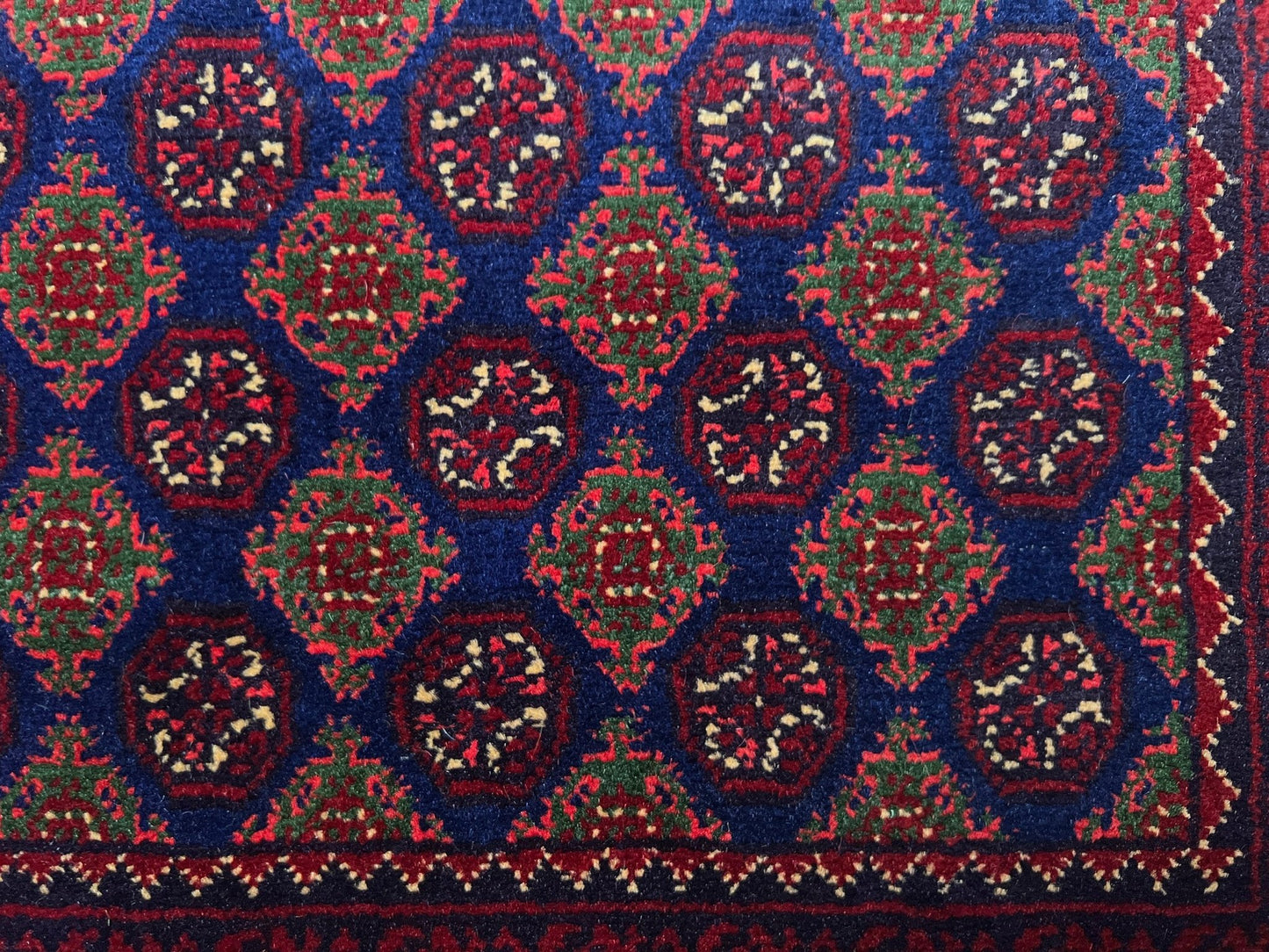 Burgundy navy Khoja Roshnai fine handmade area rug shop palo alto. Oriental rug shop san francisco bay area. Luxury rug from afghanistan