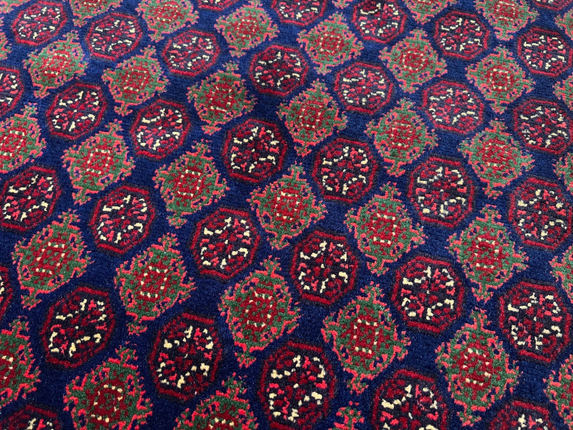 Burgundy navy Turkmen fine handmade area rug shop palo alto. Oriental rug shop san francisco bay area. Luxury rug from afghanistan
