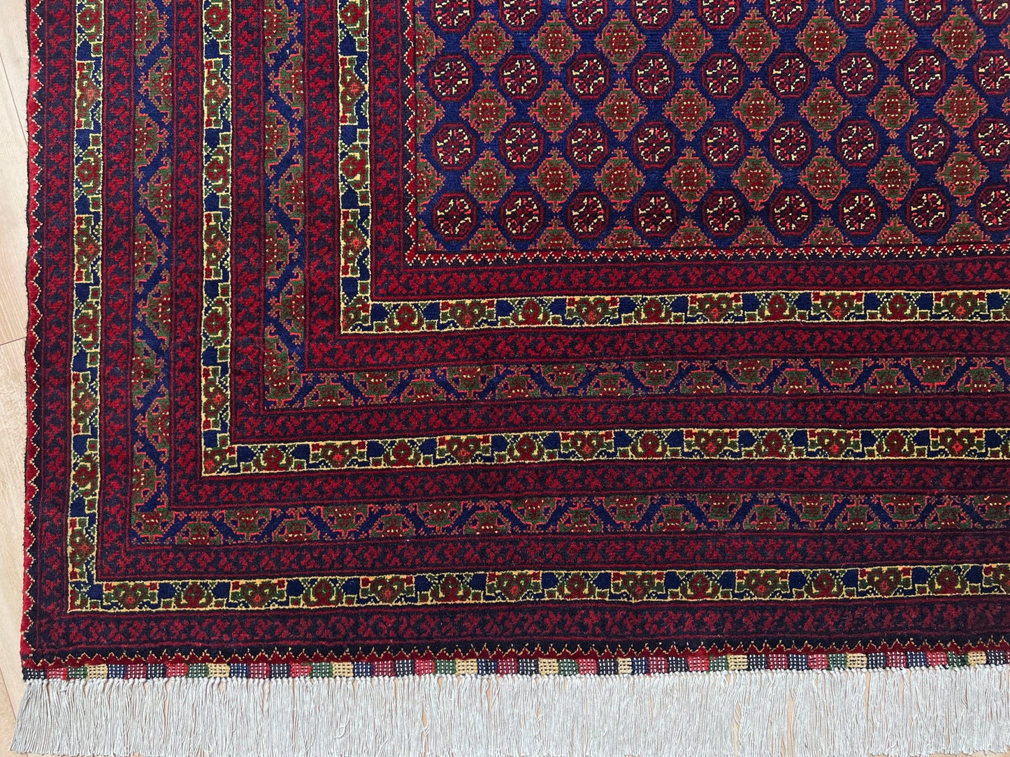 Burgundy navy Turkmen fine handmade area rug shop palo alto. Oriental rug shop san francisco bay area. Luxury rug from afghanistan