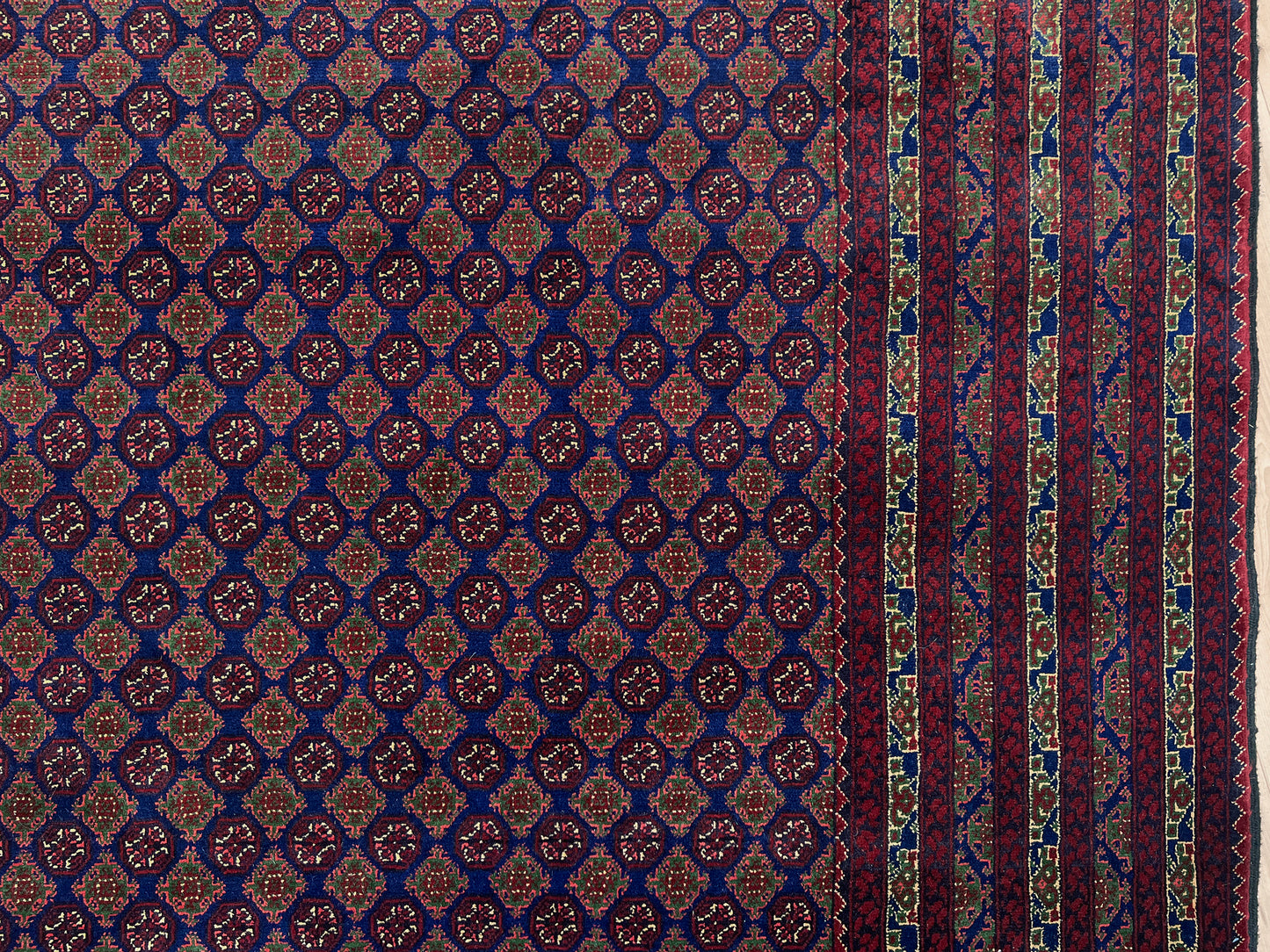 Burgundy navy Turkmen fine handmade area rug shop palo alto. Oriental rug shop san francisco bay area. Luxury rug from afghanistan