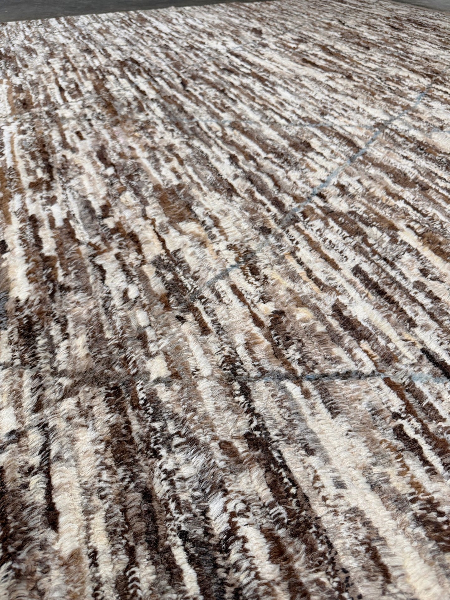 Square 9x10 handmade Turkish Tulu rug with ivory and brown textured wool pile, subtle diamond lattice design — shown at Indigo Rugs, Burlingame — San Francisco Bay Area with free shipping