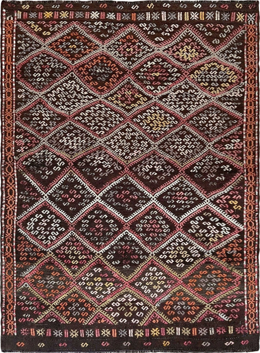 Vintage Turkish cicim kilim rug, approx. 4x5, with deep espresso brown field and diamond motifs in dusty rose, amber, soft terracotta, muted olive green, ivory, and subtle mauve tones. Handwoven wool flatweave from Indigo Rugs, Burlingame — San Francisco Bay Area.