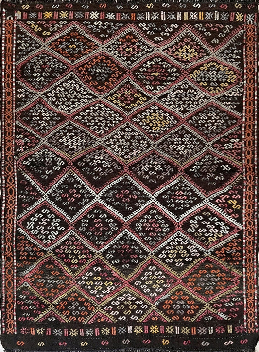Vintage Malatya Cicim Turkish kilim rug with embroidered diamond motifs in rose, amber, and ivory on a charcoal brown field — handmade wool flatweave from the 1940s, available at Indigo Rugs, the best rug shop in San Francisco Bay Area, Burlingame CA.