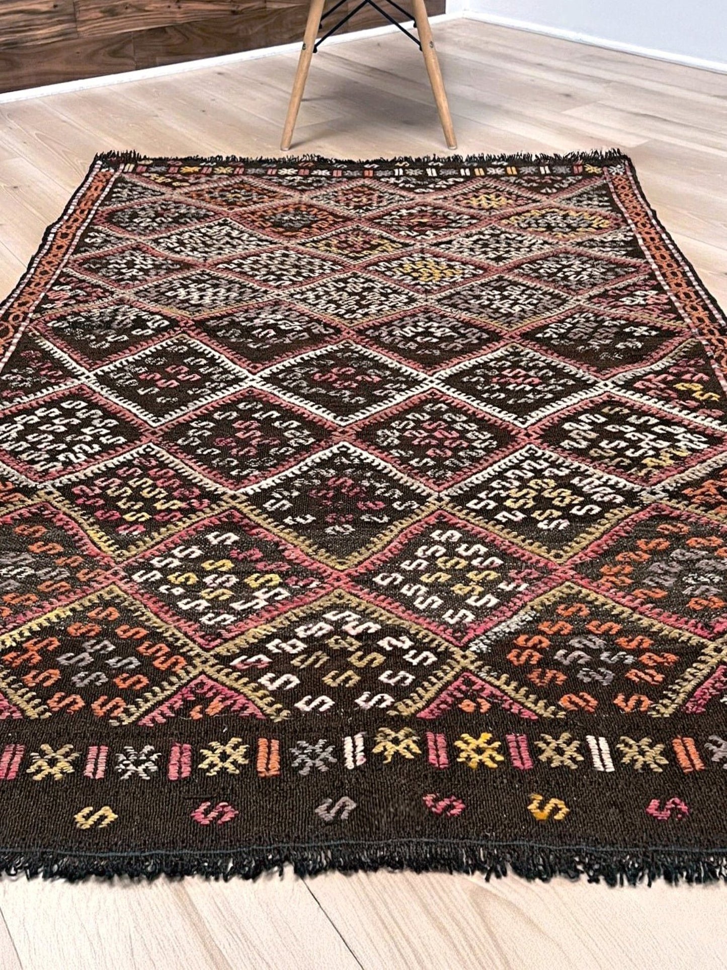 Vintage Turkish cicim kilim rug, approx. 4x5 square, with deep espresso brown field and diamond motifs in dusty rose, amber, soft terracotta, muted olive green, ivory, and subtle mauve tones. Handwoven wool flatweave from Indigo Rugs, Burlingame — San Francisco Bay Area.