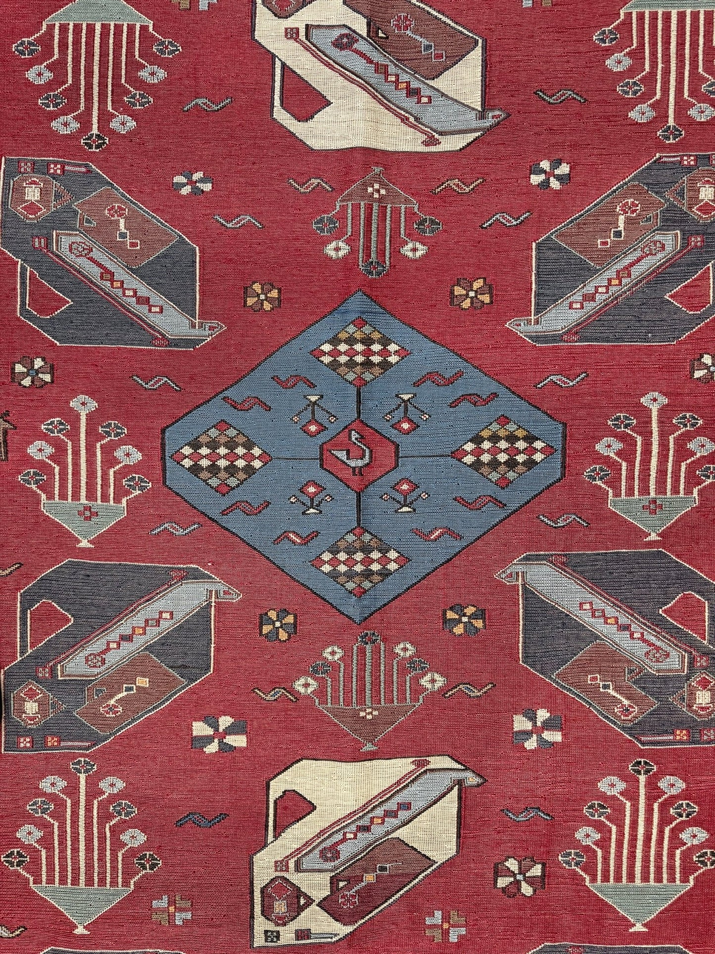 Vintage Armenian soumak rug with pictorial motifs in madder red, slate blue, ivory, and charcoal, 4x6 size.