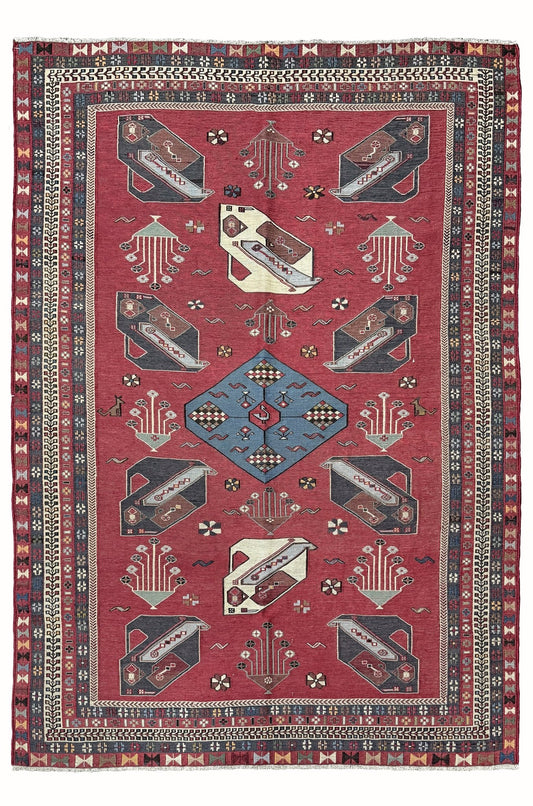 Vintage Armenian soumak rug with pictorial motifs in madder red, slate blue, ivory, and charcoal, 4x6 size.