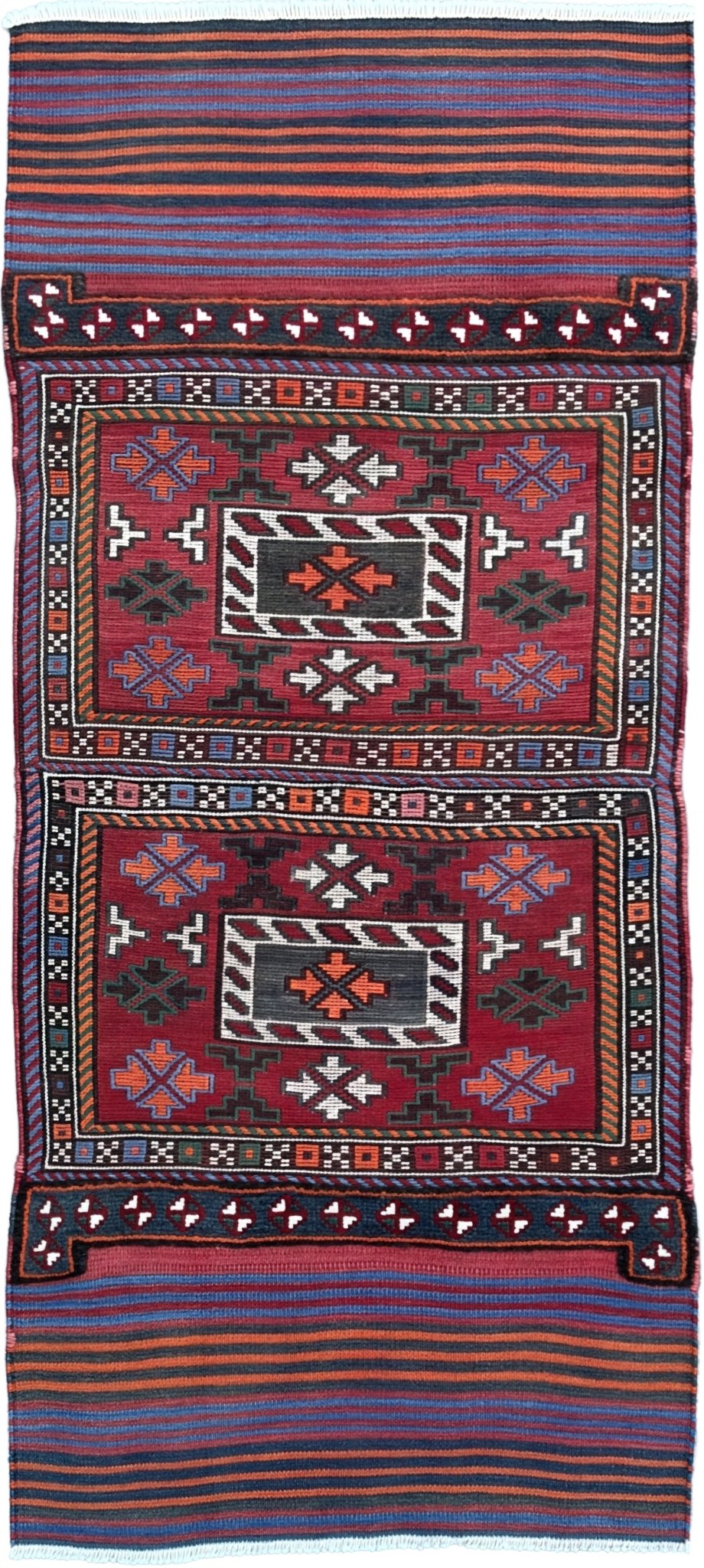 Vintage Bakhtiari Khorjin saddle bag rug 2x6 — 1940s Persian tribal runner handwoven with flatweave, pile, and soumak techniques in crimson, indigo, orange, and ivory — antique wool rug from Northwest Persia, Indigo Rugs Burlingame CA.