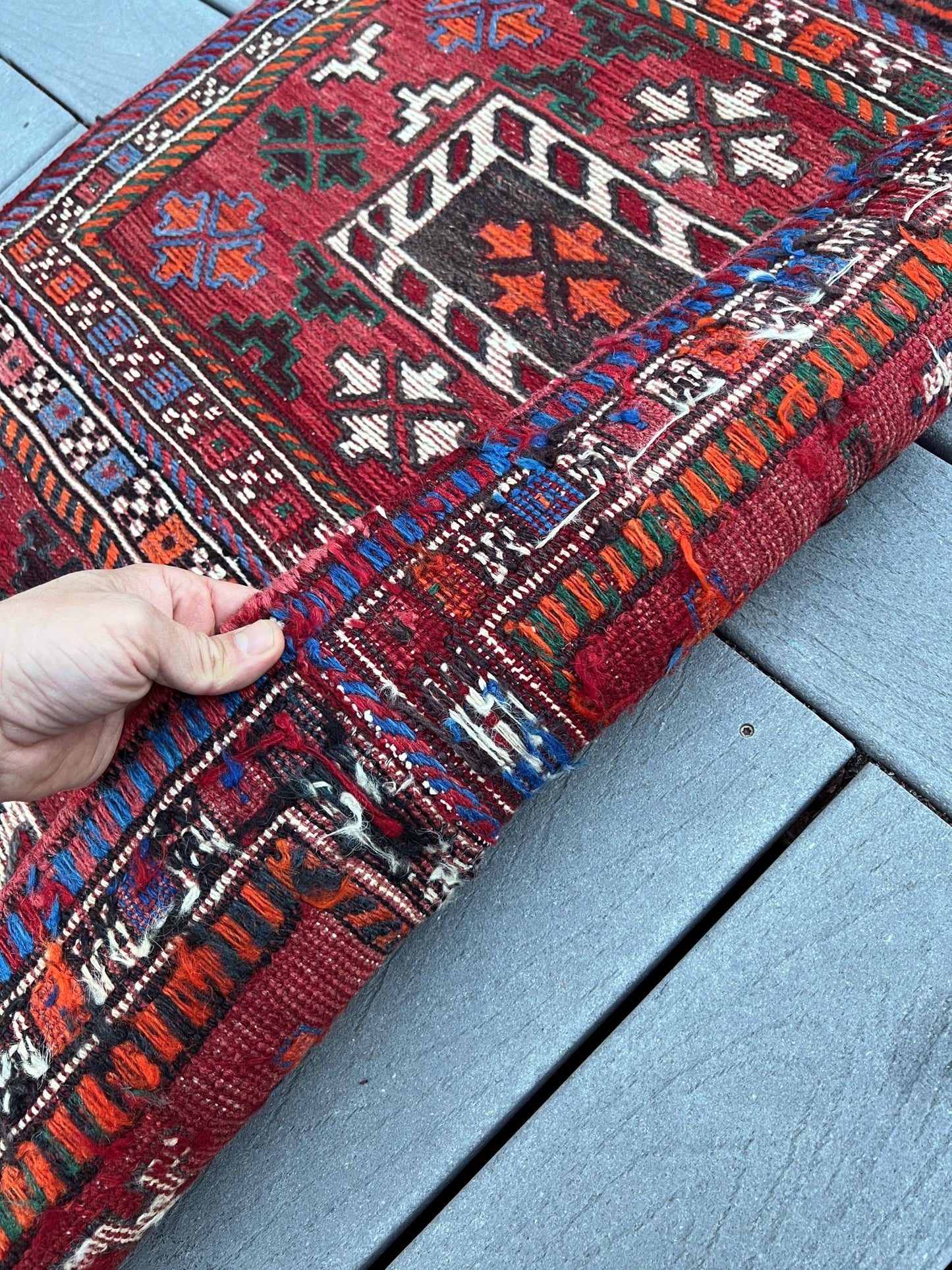 Vintage Bakhtiari Khorjin saddle bag rug 2x6 — 1940s Persian tribal runner handwoven with flatweave, pile, and soumak techniques in crimson, indigo, orange, and ivory — antique wool rug from Northwest Persia, Indigo Rugs Burlingame CA.