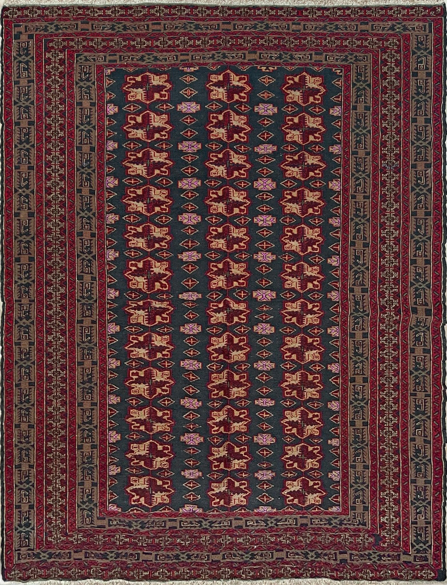 Vintage Caucasian Soumak flatweave rug with charcoal blue field, madder red rose motifs, and intricate tribal borders — handmade wool wall hanging from the 1950s, available at Indigo Rugs, the best rug shop in San Francisco Bay Area, Burlingame CA.