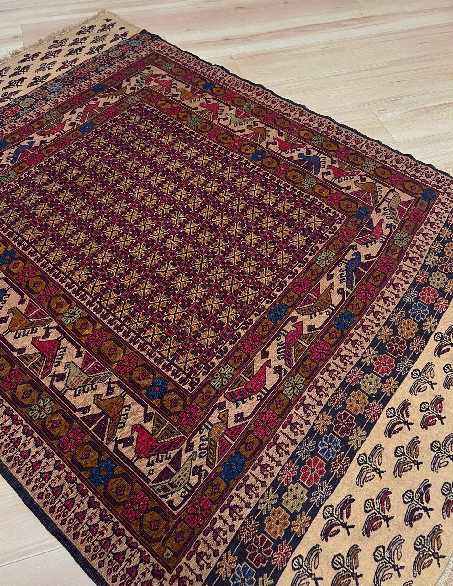 4x6 Vintage Armenian soumak rug with geometric motifs and stylized birds in burgundy, navy, ivory.  Scatter handmade wool rug for living room, bedroom, study under coffee table. Vintage rug shop SF bay area burlingame ca.