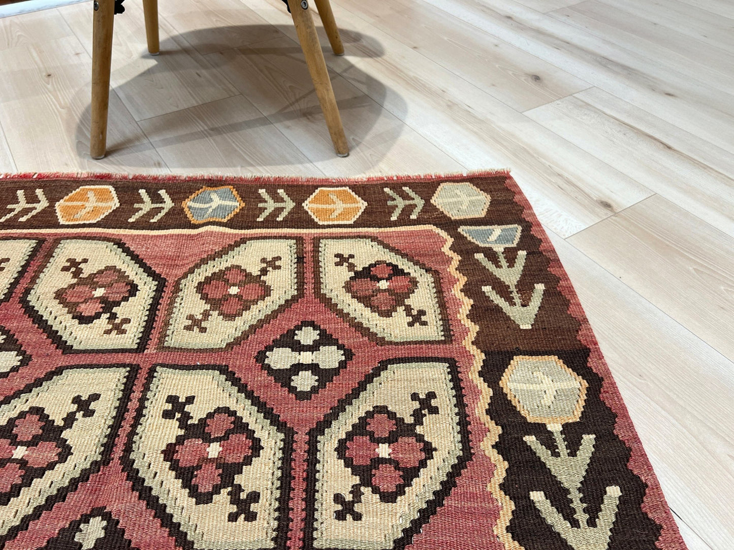 Vintage Floral Balkan kilim flatweave rug in blush terracotta, cream, and cocoa brown with geometric floral motifs — handmade wool wall hanging from the 1960s, available at Indigo Rugs, the best rug shop in San Francisco Bay Area, Burlingame CA.