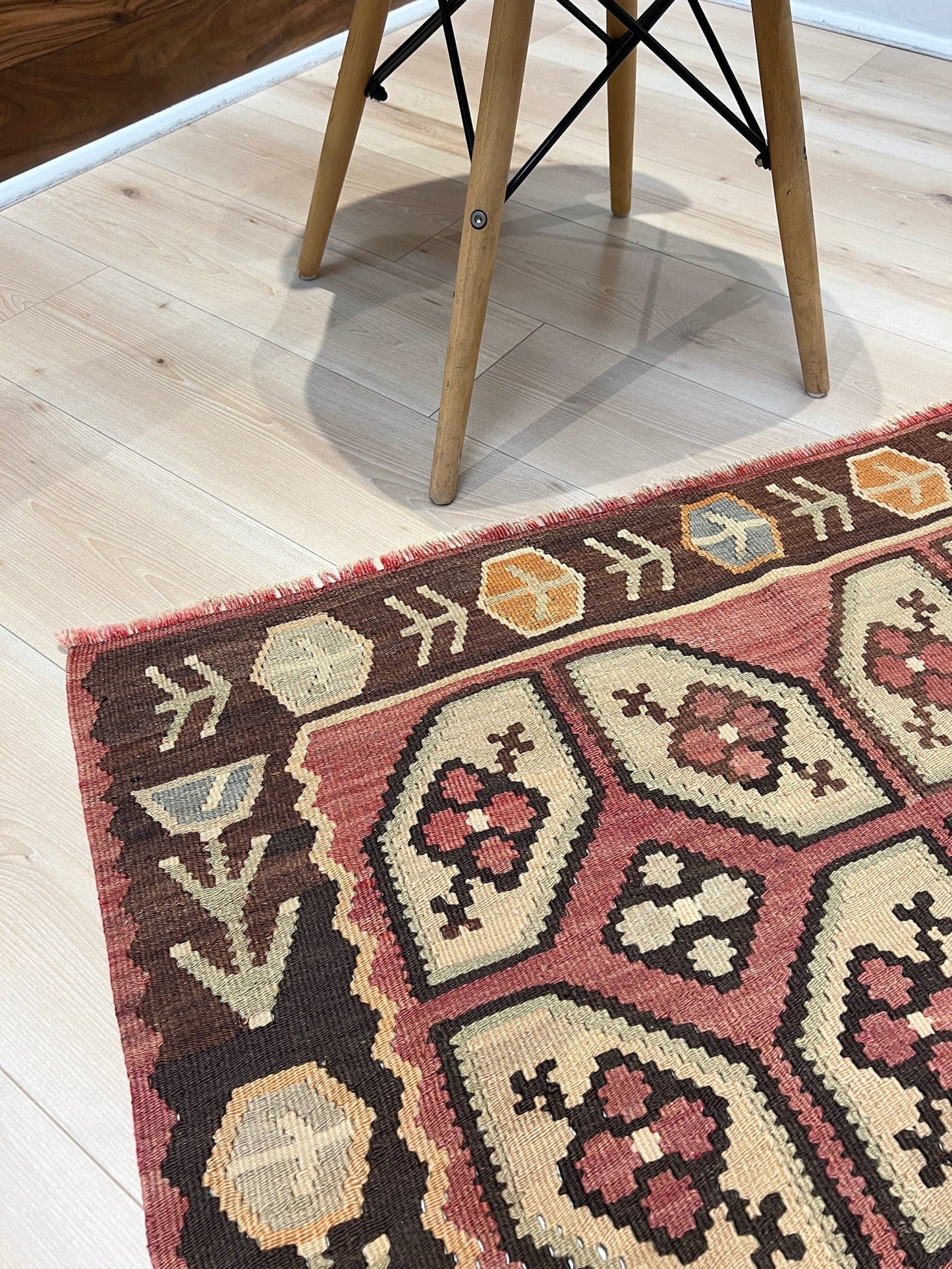 Vintage Floral Balkan kilim flatweave rug in blush terracotta, cream, and cocoa brown with geometric floral motifs — handmade wool wall hanging from the 1960s, available at Indigo Rugs, the best rug shop in San Francisco Bay Area, Burlingame CA.