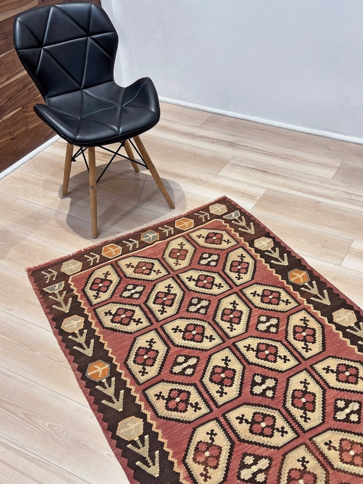 Vintage Floral Balkan kilim rug in brown earthy tones with geometric floral motifs — handmade wool rug, available at Indigo Rugs, the best rug shop in San Francisco Bay Area, Burlingame CA.