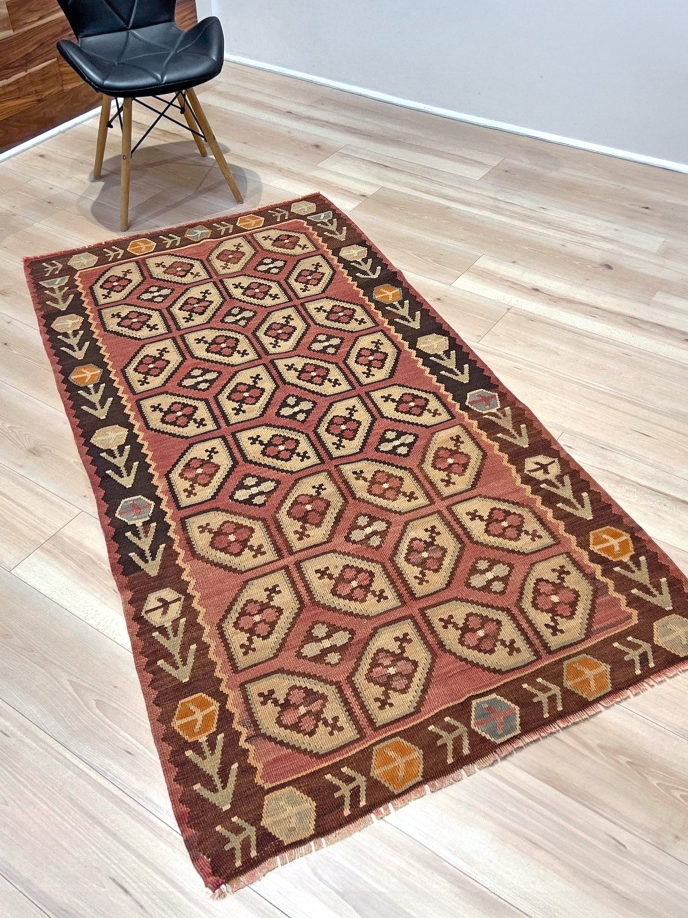 Vintage Floral Balkan kilim flatweave rug in blush terracotta, cream, and cocoa brown with geometric floral motifs — handmade wool wall hanging from the 1960s, available at Indigo Rugs, the best rug shop in San Francisco Bay Area, Burlingame CA.