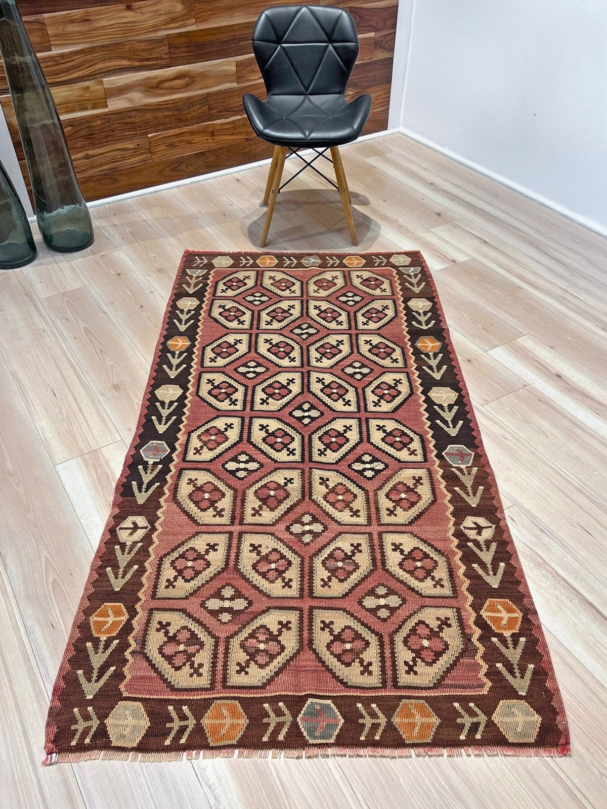 Vintage Floral Balkan kilim rug in brown earthy tones with geometric floral motifs — handmade wool rug, available at Indigo Rugs, the best rug shop in San Francisco Bay Area, Burlingame CA.