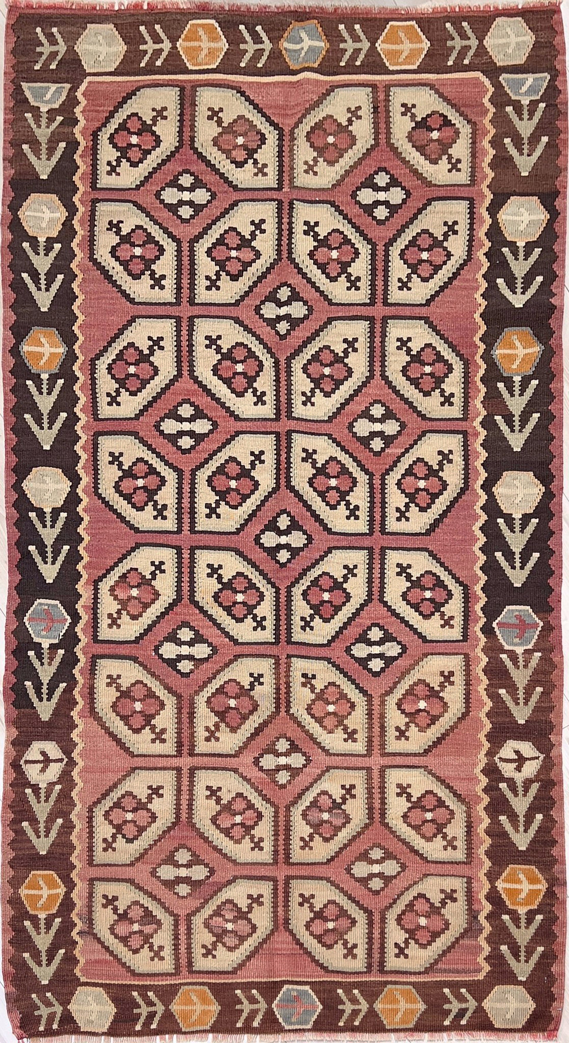 Vintage Floral Balkan kilim flatweave rug in blush terracotta, cream, and cocoa brown with geometric floral motifs — handmade wool wall hanging from the 1960s, available at Indigo Rugs, the best rug shop in San Francisco Bay Area, Burlingame CA.