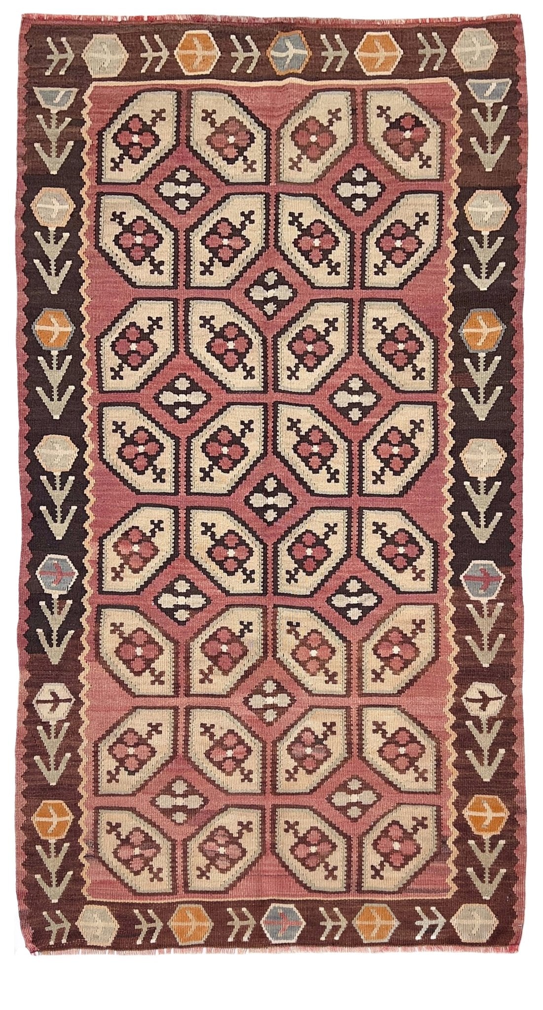 Vintage Floral Balkan kilim rug in brown earthy tones with geometric floral motifs — handmade wool rug, available at Indigo Rugs, the best rug shop in San Francisco Bay Area, Burlingame CA.