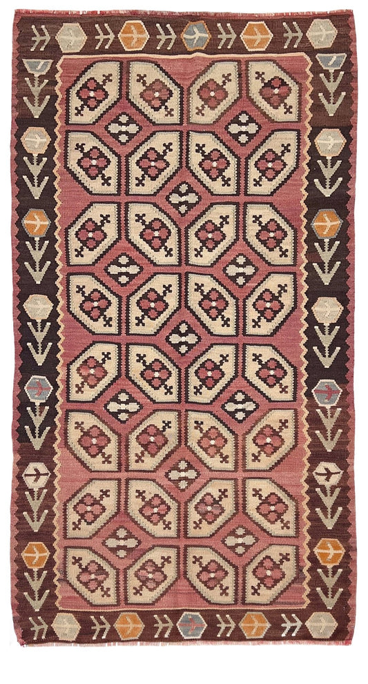 Vintage Floral Balkan kilim rug in brown earthy tones with geometric floral motifs — handmade wool rug, available at Indigo Rugs, the best rug shop in San Francisco Bay Area, Burlingame CA.