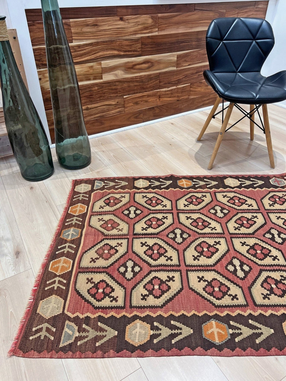 Vintage Floral Balkan kilim rug in brown earthy tones with geometric floral motifs — handmade wool rug, available at Indigo Rugs, the best rug shop in San Francisco Bay Area, Burlingame CA.