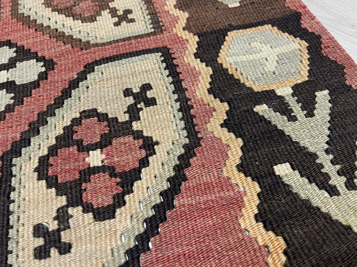 Vintage Floral Balkan kilim rug in brown earthy tones with geometric floral motifs — handmade wool rug, available at Indigo Rugs, the best rug shop in San Francisco Bay Area, Burlingame CA.