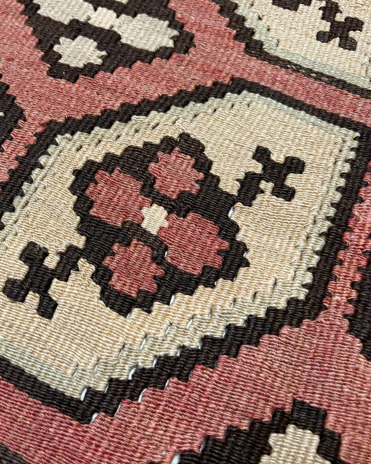 Vintage Floral Balkan kilim flatweave rug in blush terracotta, cream, and cocoa brown with geometric floral motifs — handmade wool wall hanging from the 1960s, available at Indigo Rugs, the best rug shop in San Francisco Bay Area, Burlingame CA.
