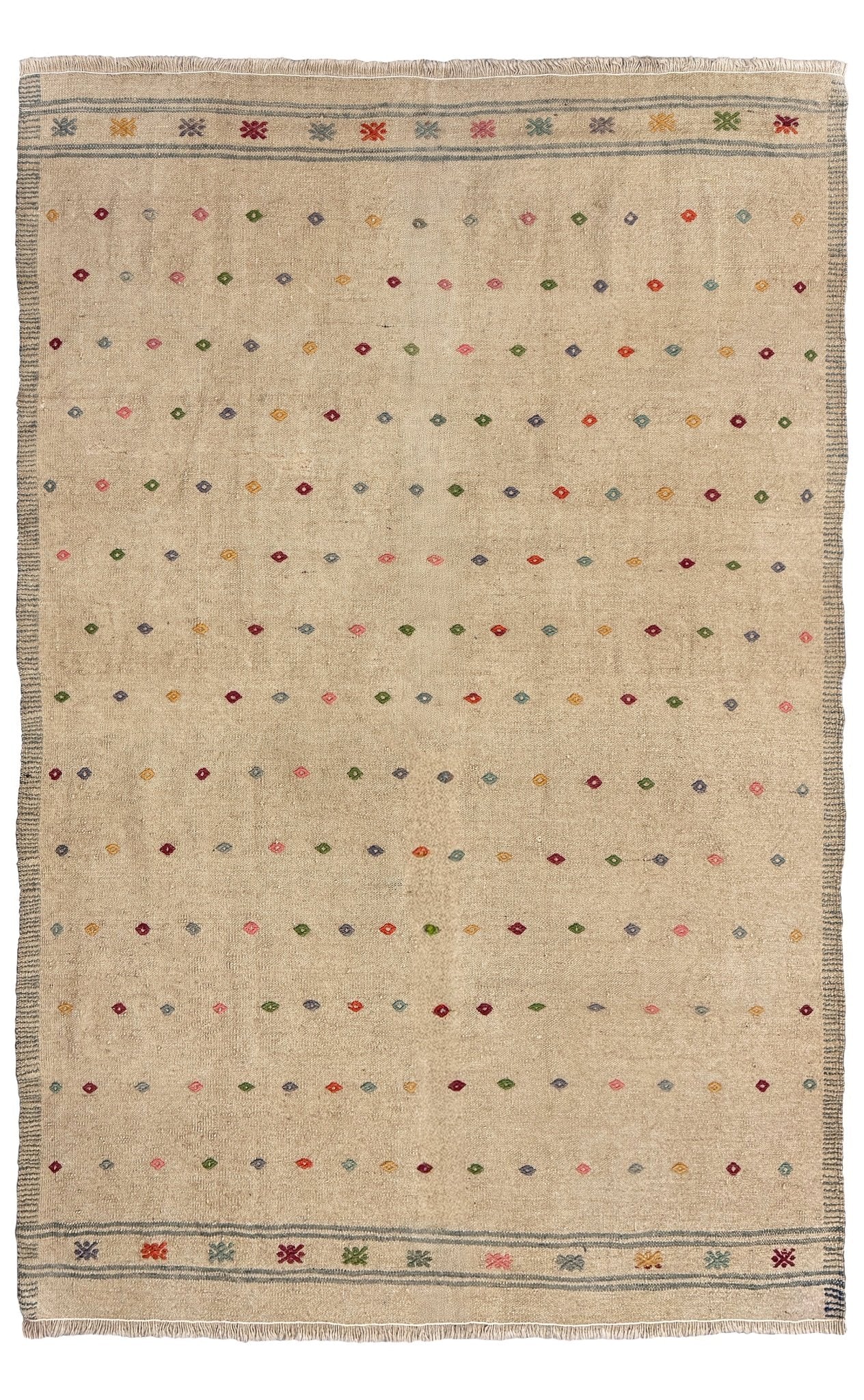 Vintage Turkish neutral kilim rug, 4x6, with small colorful tribal motifs on a natural wool background.