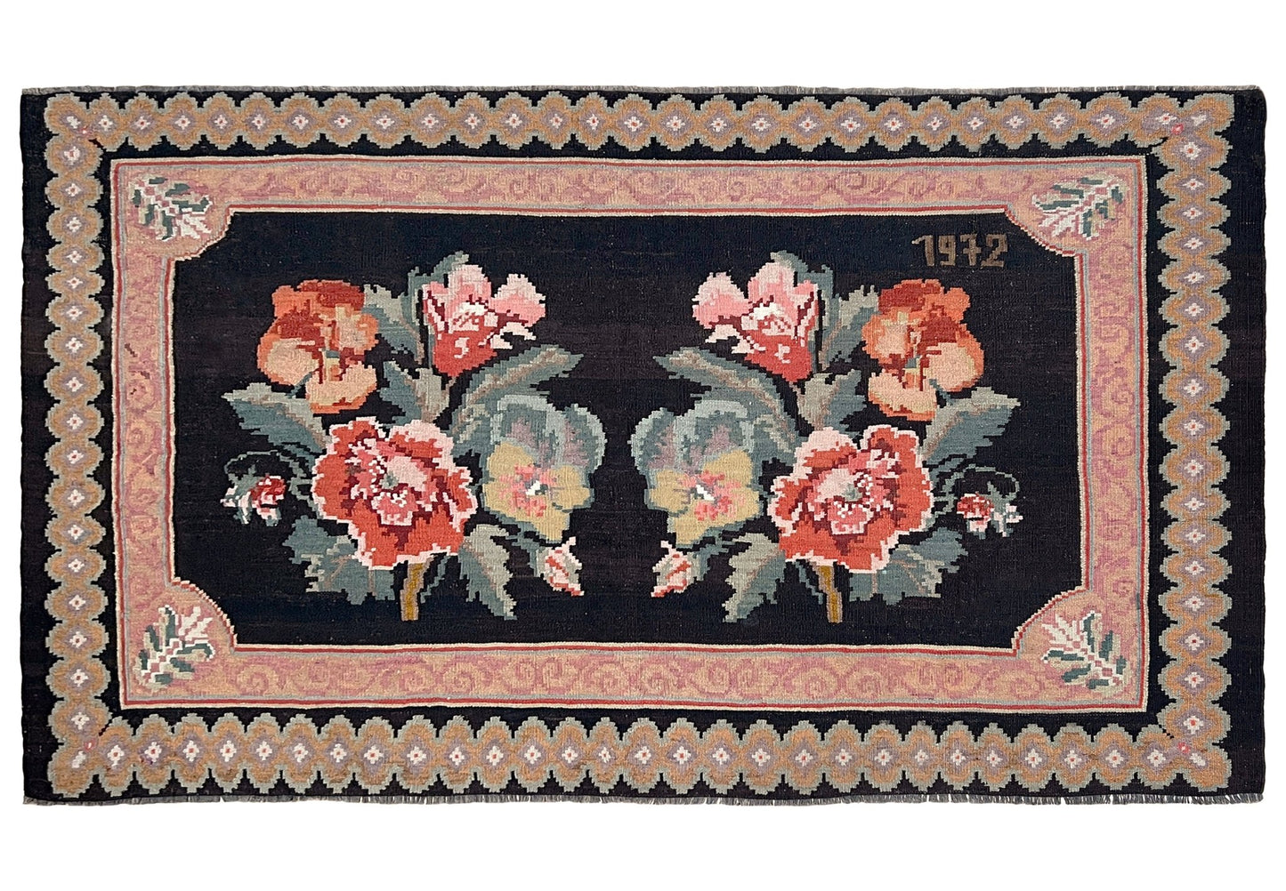 Floral patterned moldovan kilim rug with decorative border and year '1972' on a black background